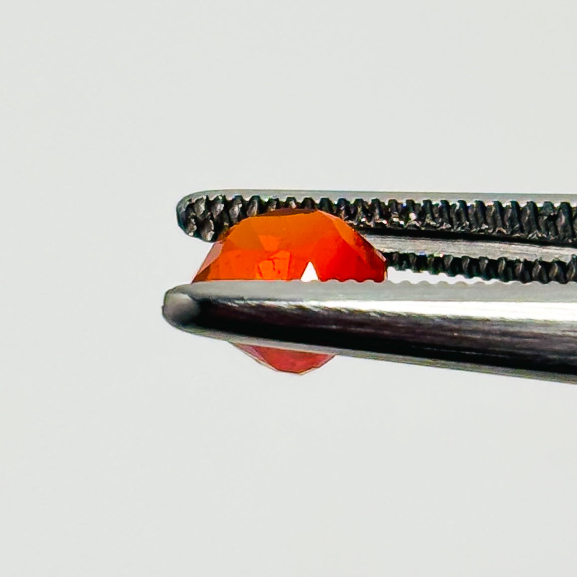 Mexican Fire Opal 6x6x5 Faceted Round 0.75 Carat