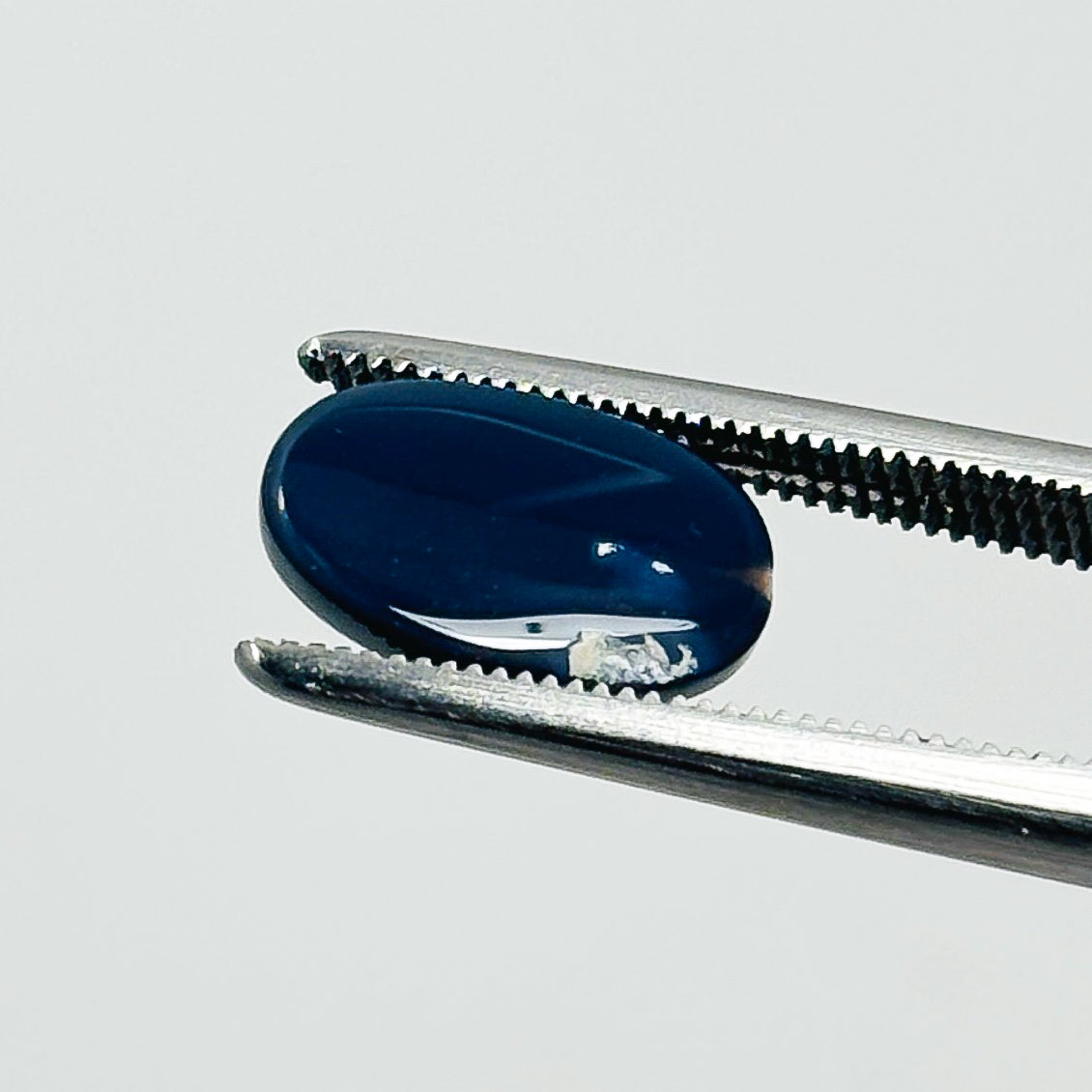 Black Opal Blue 11x7x3 Cabochon Oval 1.80 Carat
