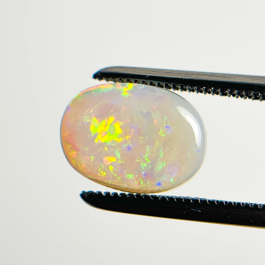 White Opal Red Multicolour 10x7x4 Cabochon Oval 2.35 Carat