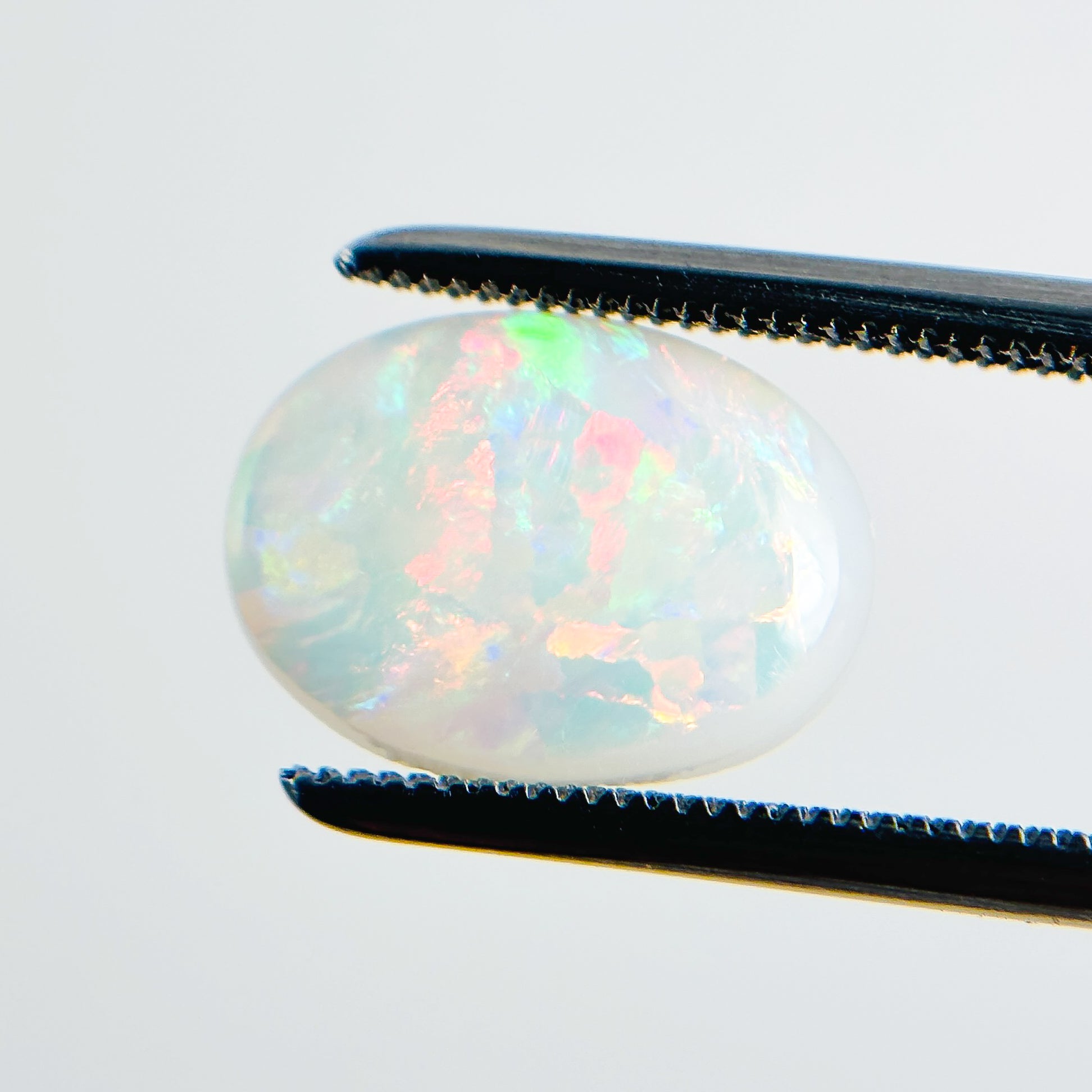 White Opal Red Multicolour 12x9x2.5 Cabochon Oval 1.70 Carat