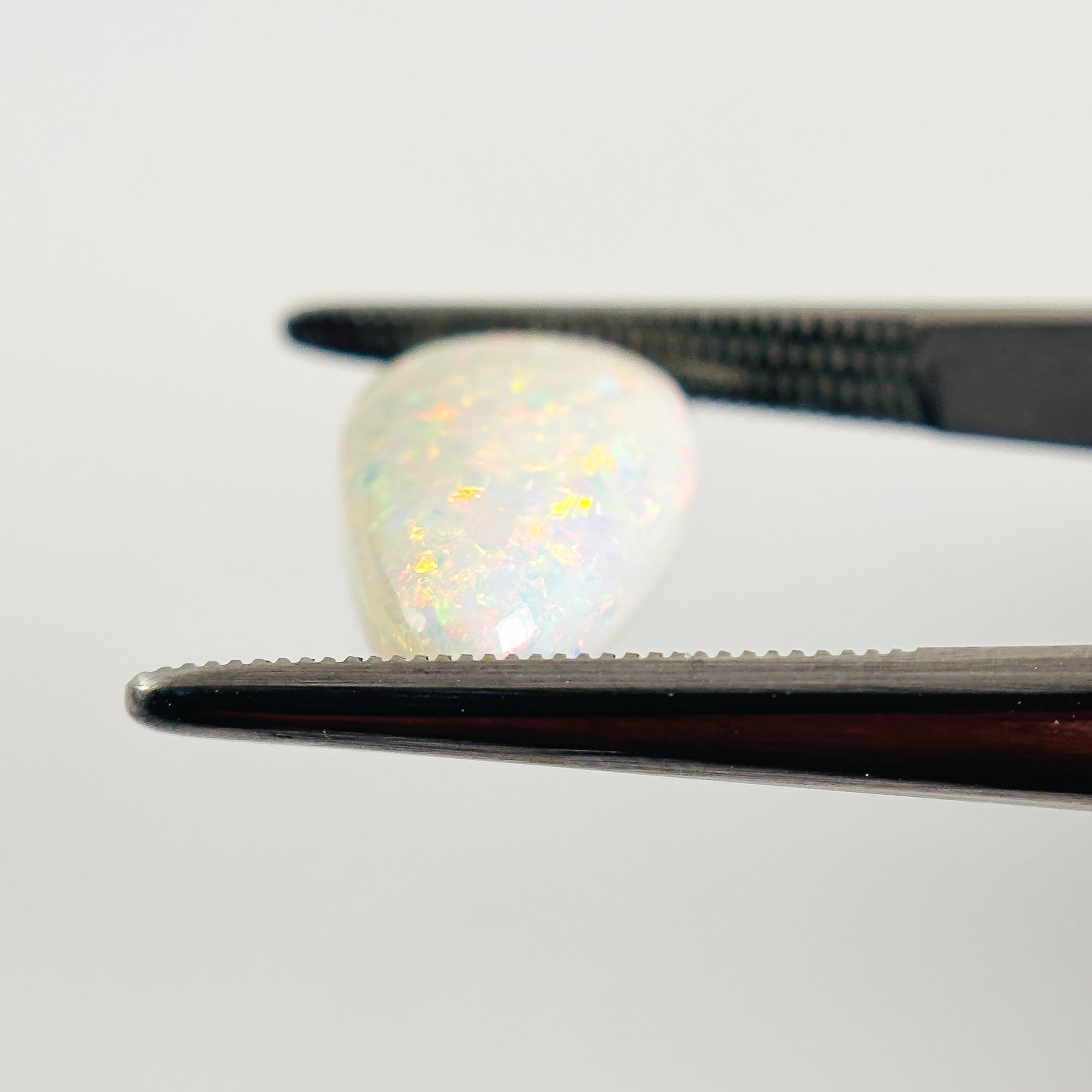 White Opal Multicolour 15x9x6 Cabochon Pear 5.05 Carat