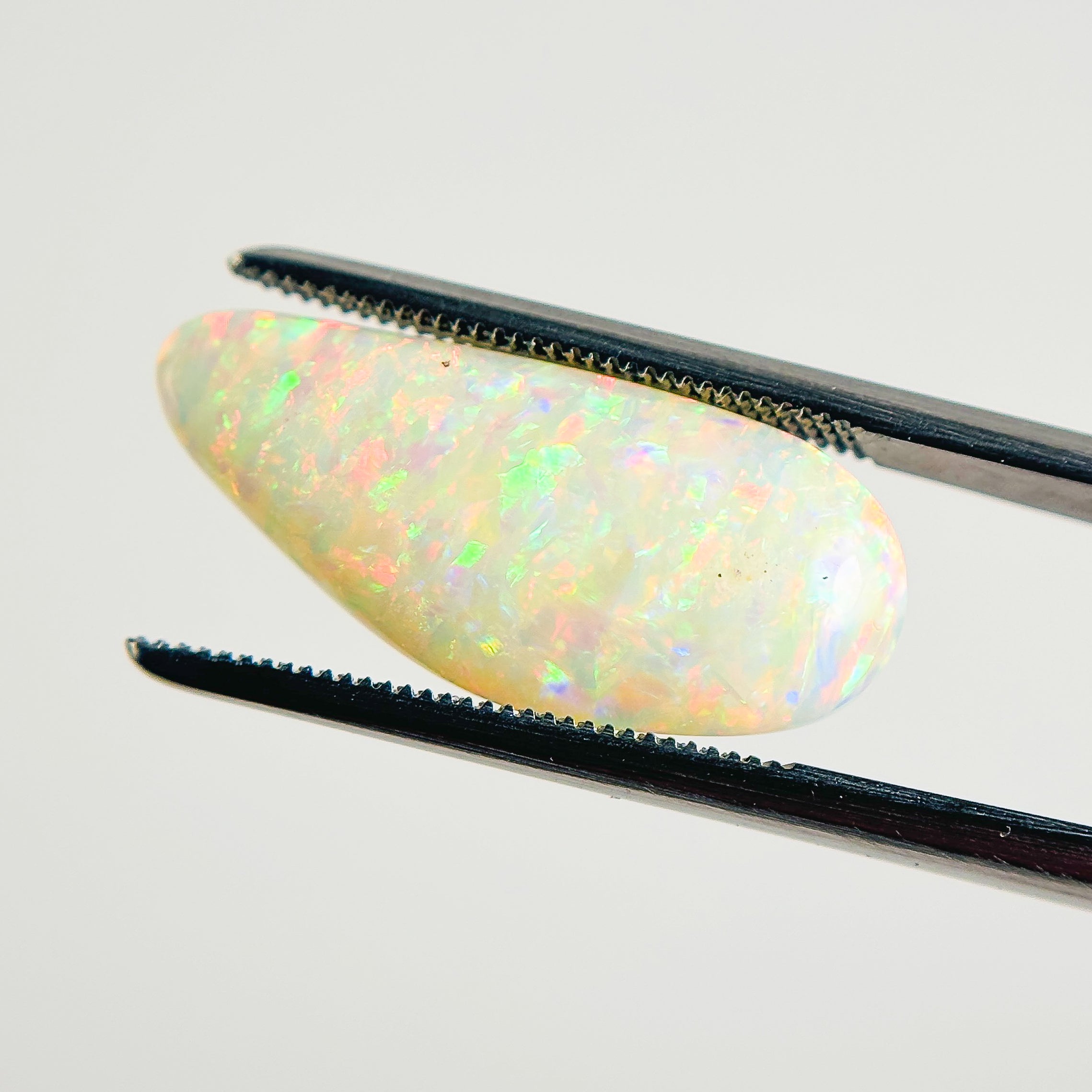 White Opal Multicolour 21x10x5.5 Cabochon Freeform 6.65 Carat