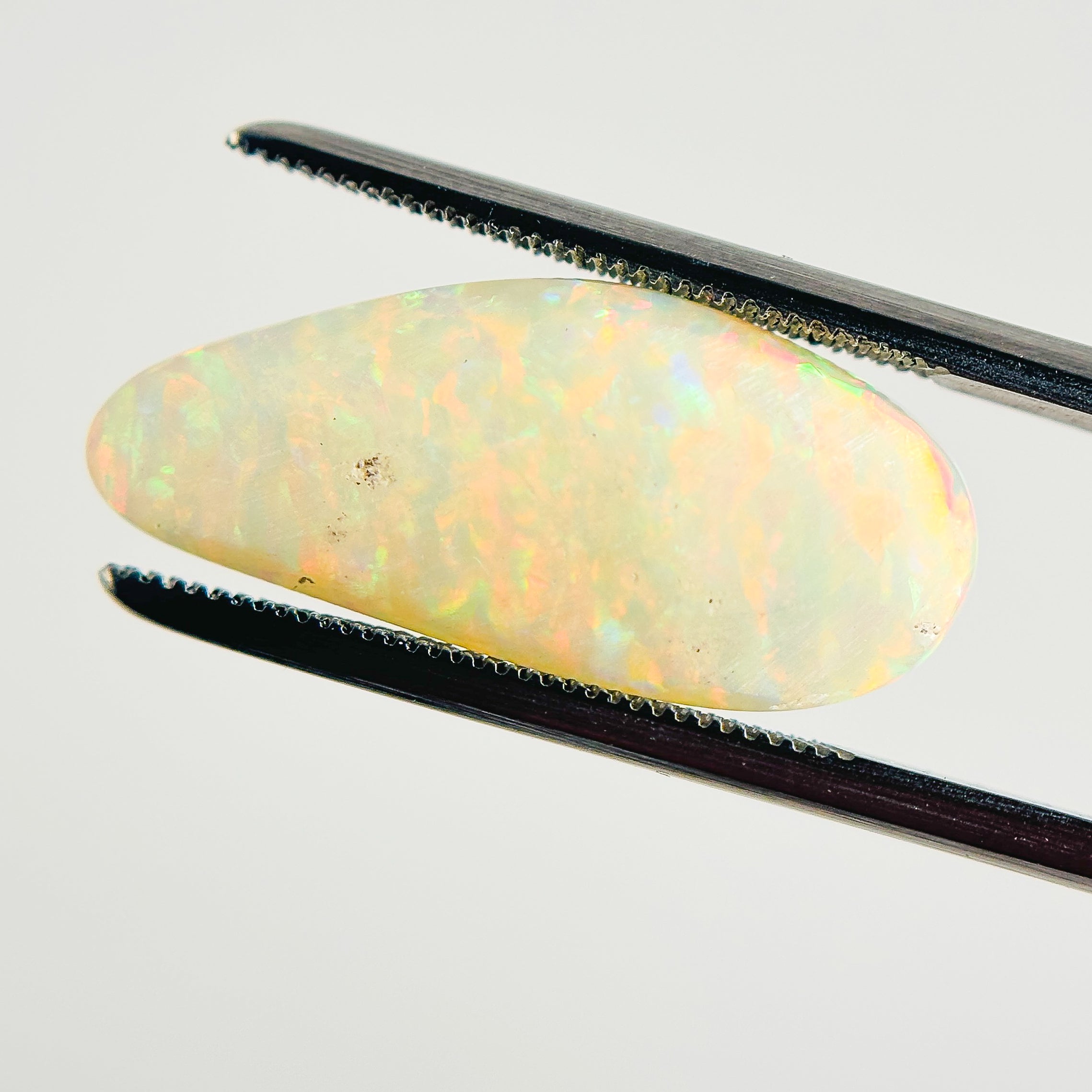 White Opal Multicolour 21x10x5.5 Cabochon Freeform 6.65 Carat