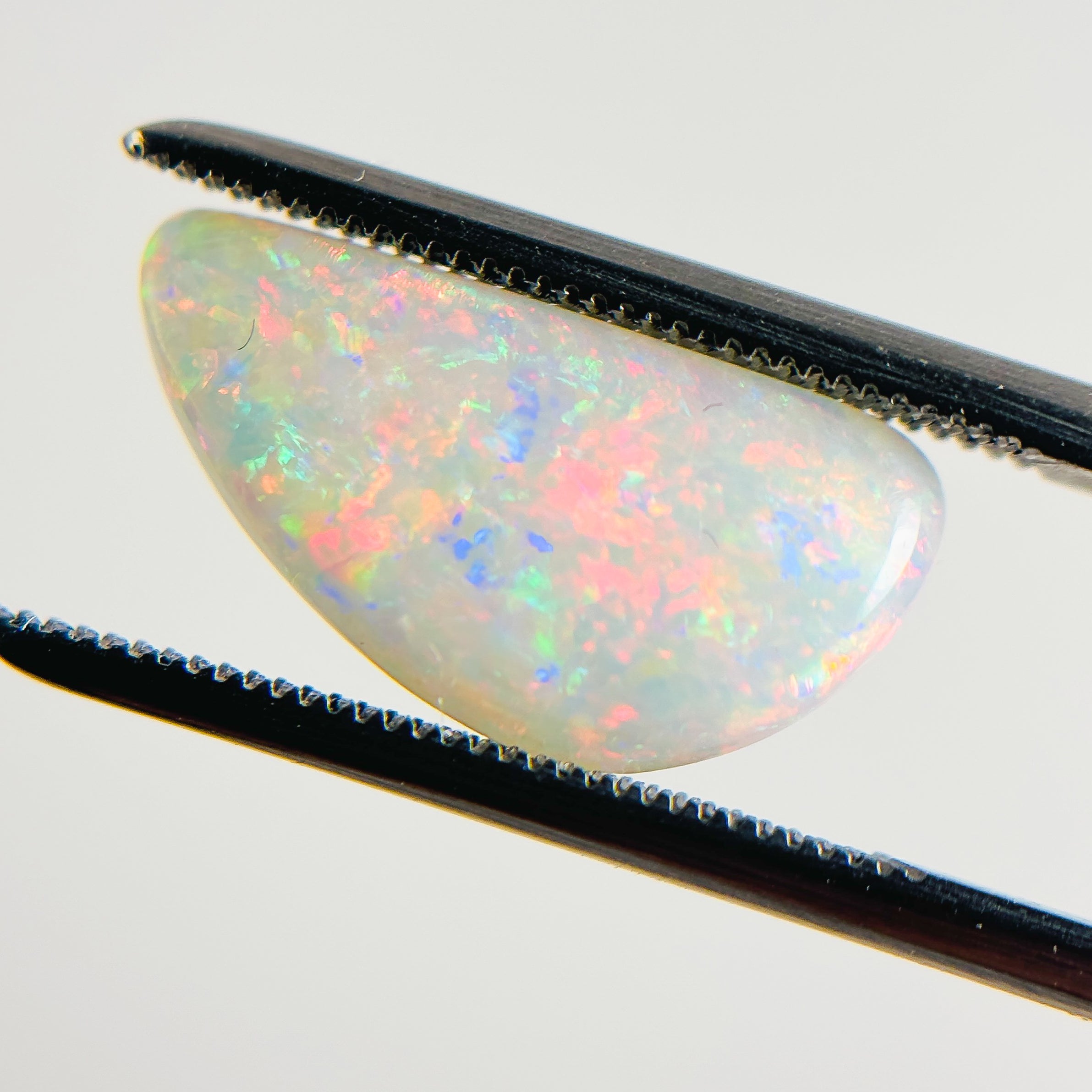 White Opal Multicolour 16X9X4 Cabochon Freeform 3.45 Carat