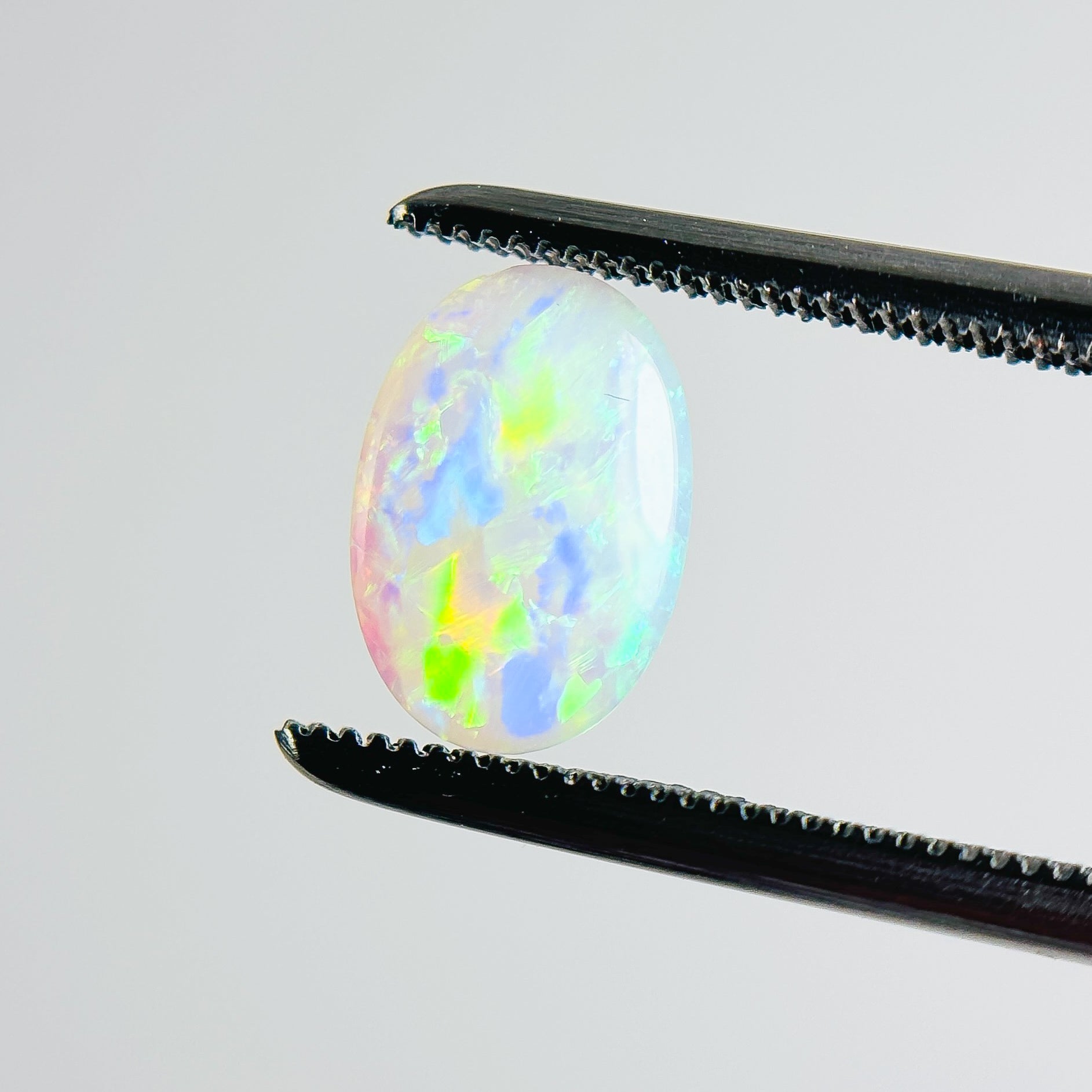 White Opal Green Multicolour 9x6x2 Cabochon Oval 0.45 Carat