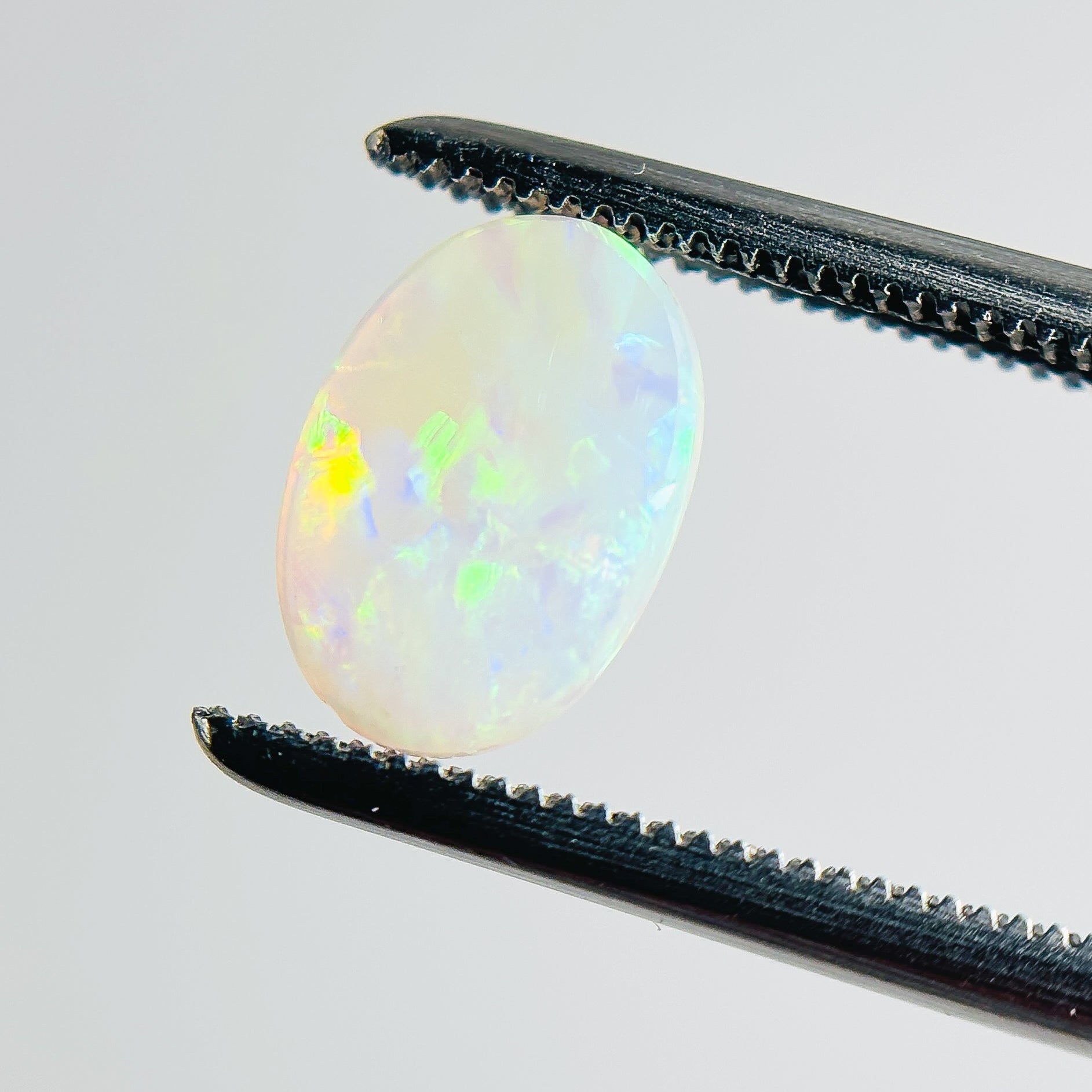 White Opal Green Multicolour 9x6x2 Cabochon Oval 0.45 Carat