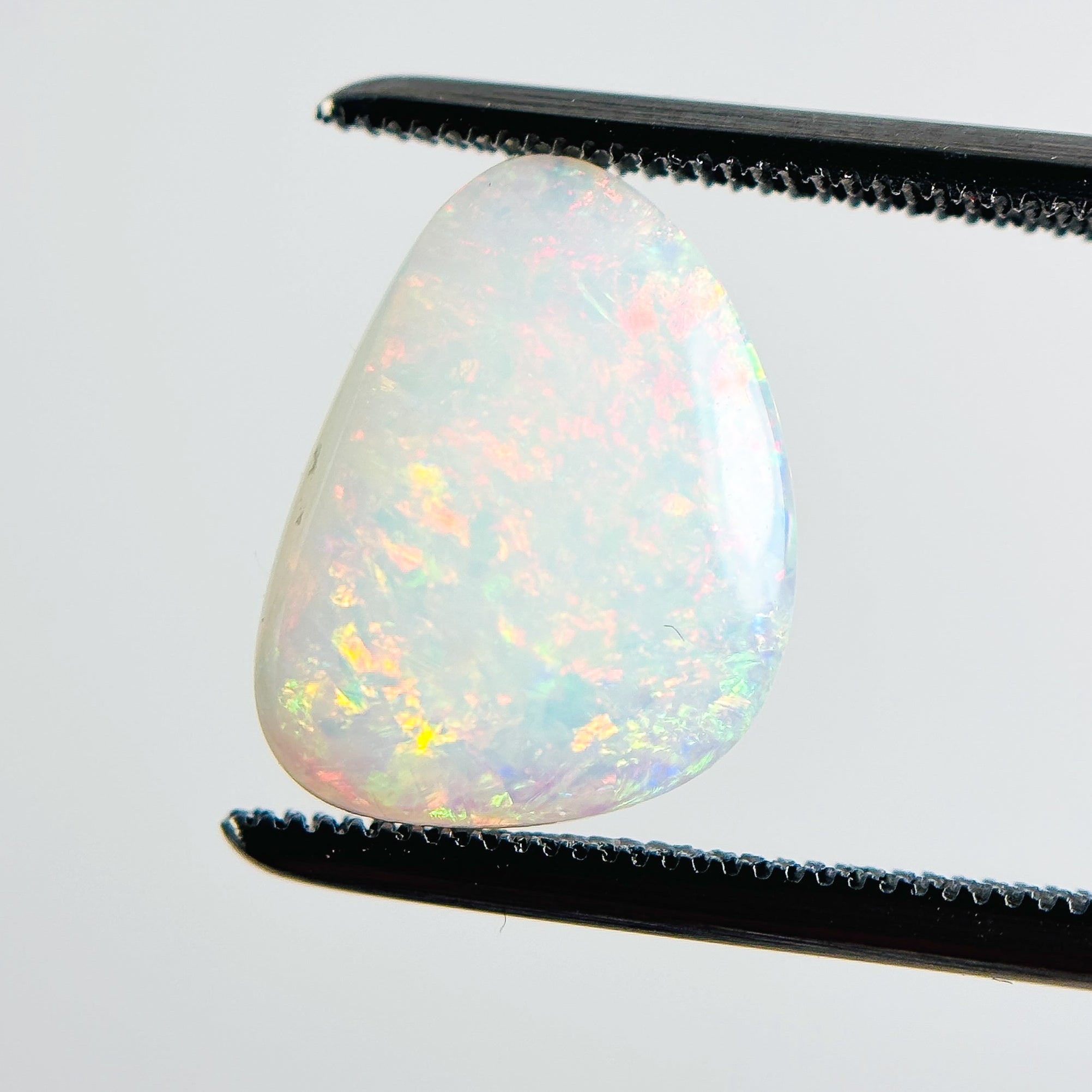 White Opal Multicolour 13x9x3 Cabochon Freeform 2.45 Carat