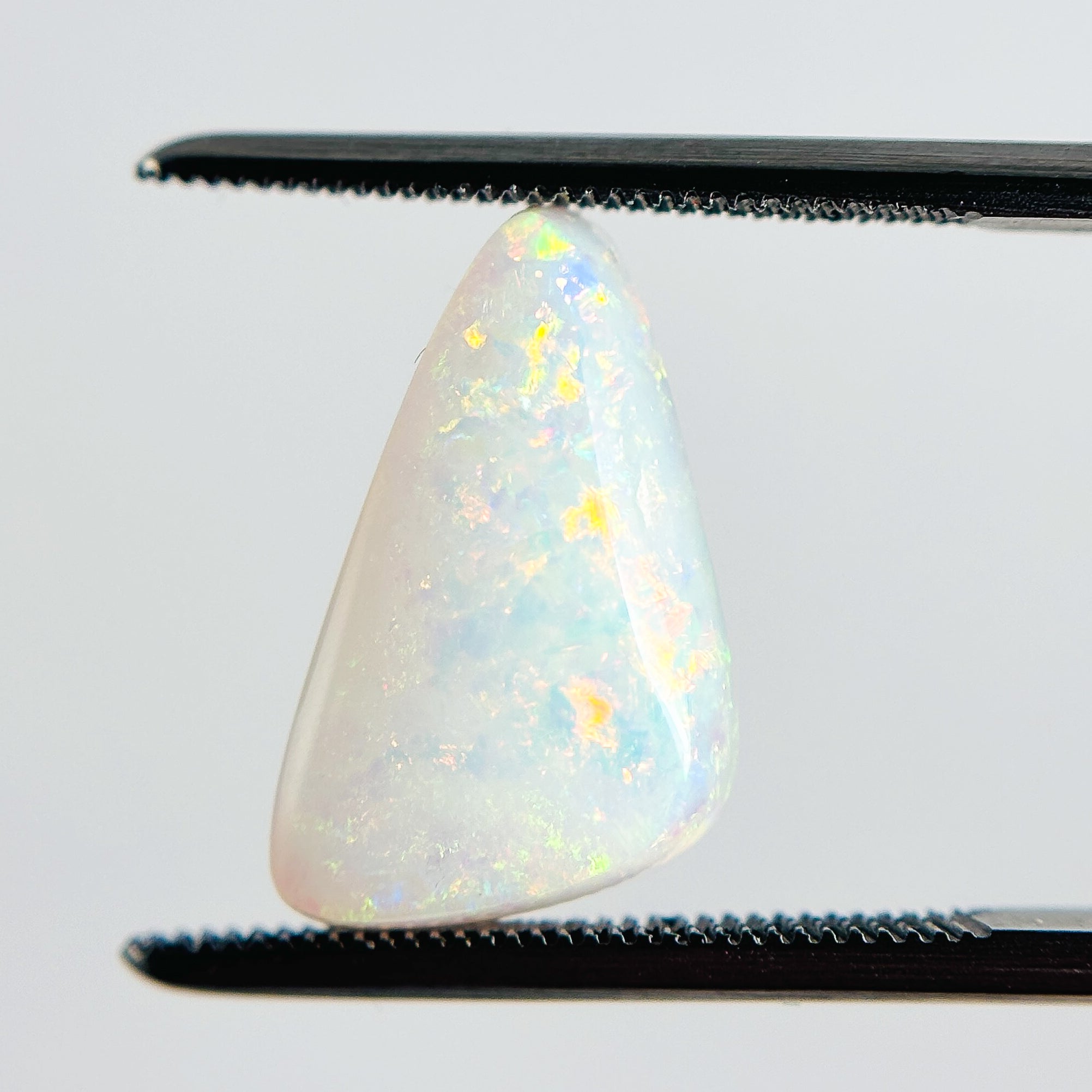 White Opal Multicolour 16x9x4 Cabochon Freeform 3.40 Carat