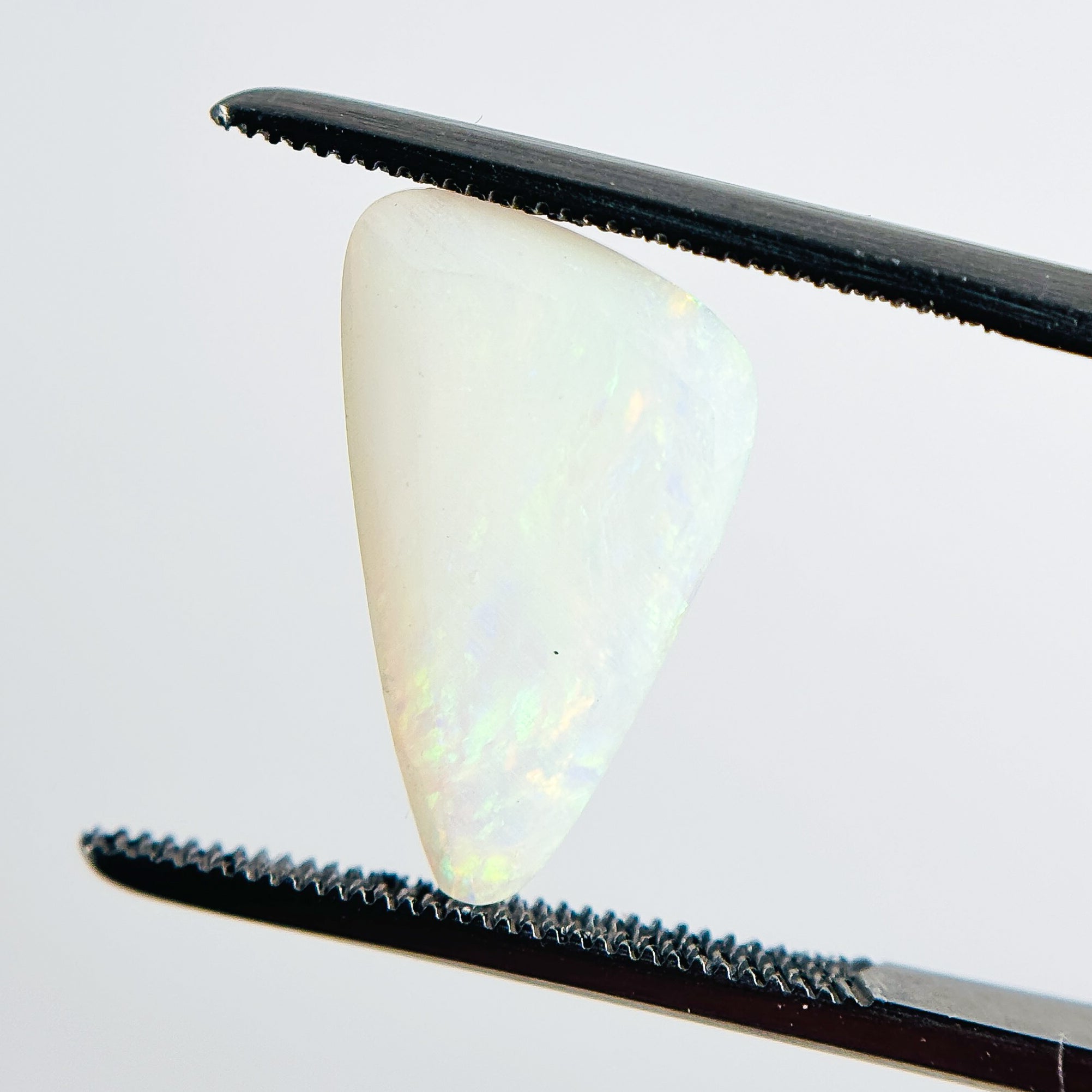 White Opal Multicolour 16x9x4 Cabochon Freeform 3.40 Carat