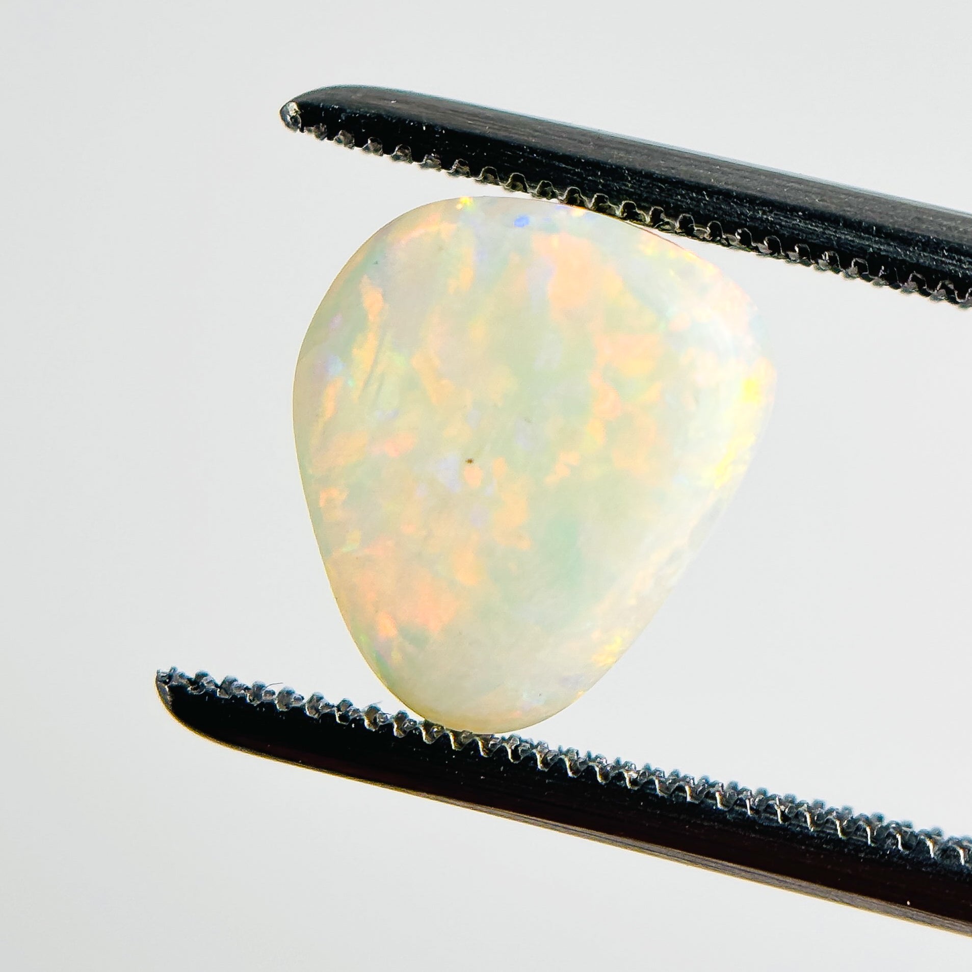 White Opal Multicolour 10x8x3.5 Cabochon Freeform 2.15 Carat