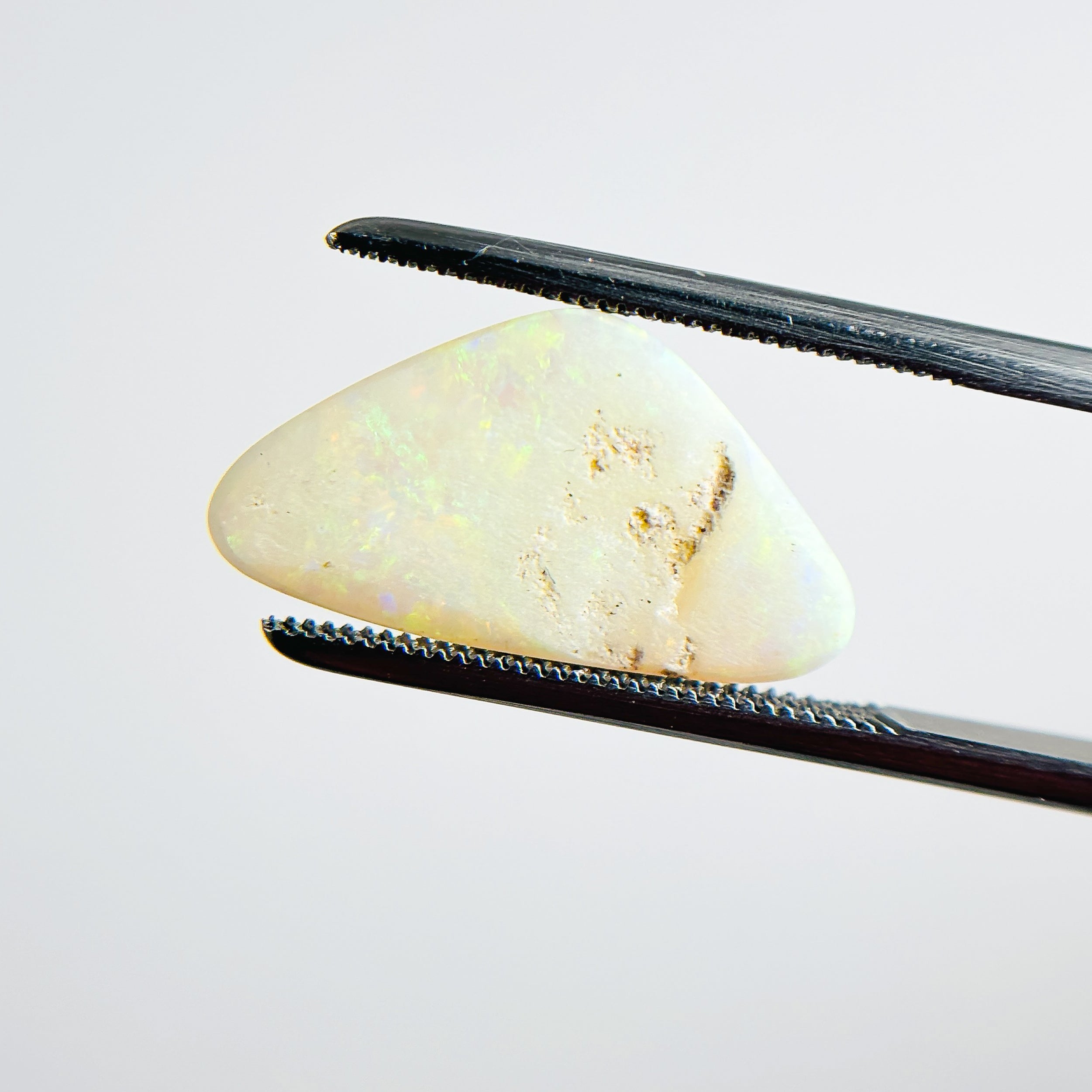 White Opal Multicolour 28x10x4 Cabochon Freeform 3.75 Carat