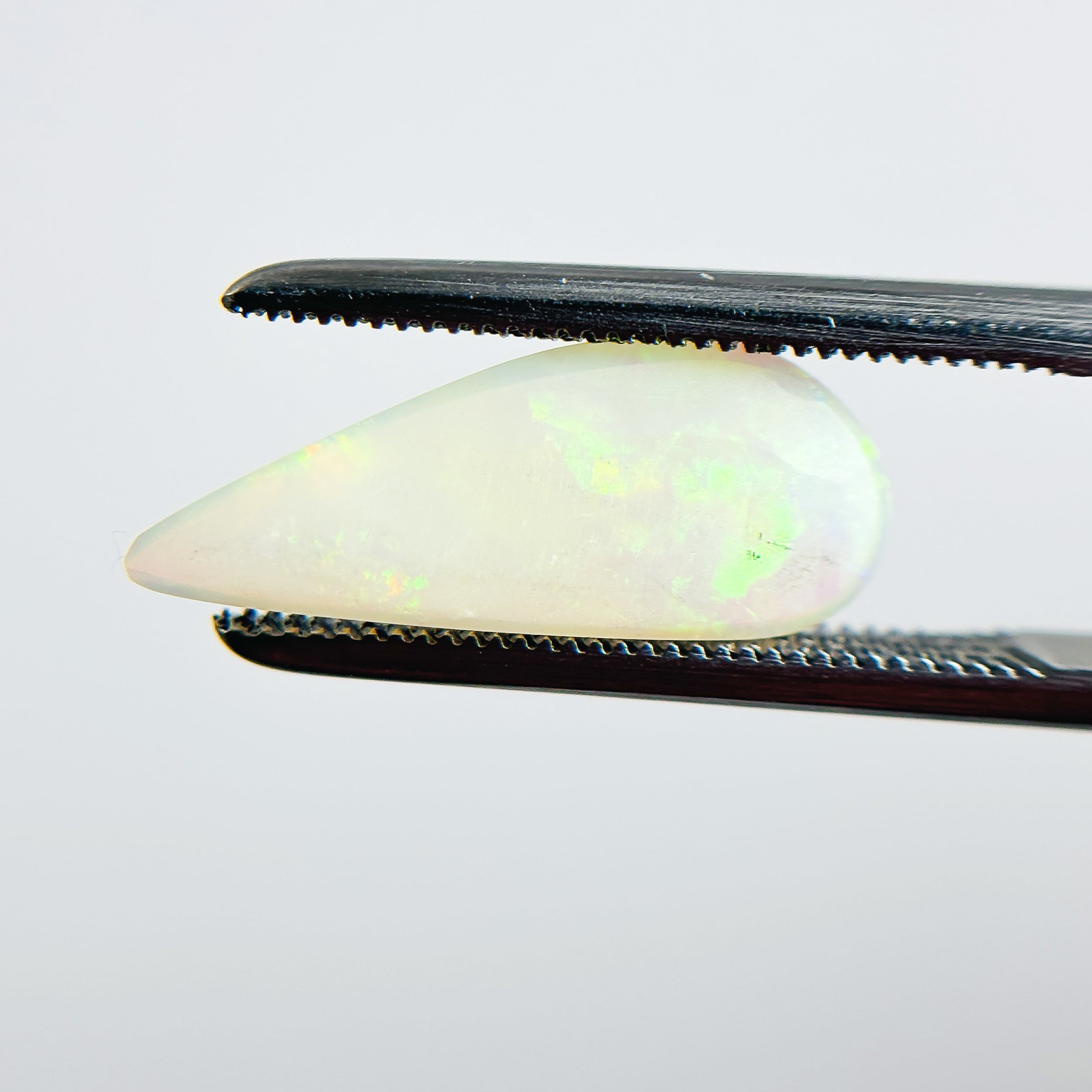 White Opal Multicolour 17x7x3 Cabochon Freeform 1.95 Carat