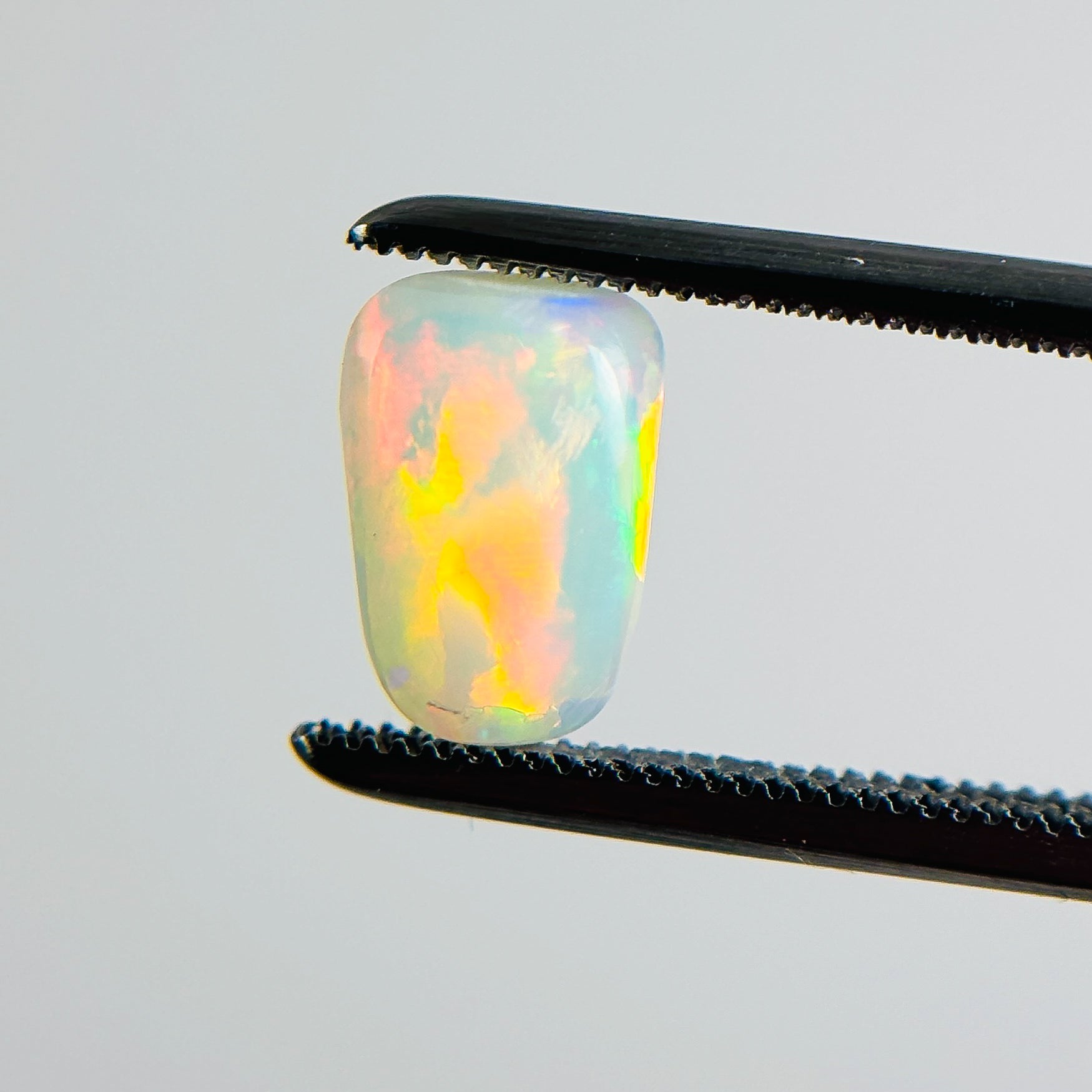 White Opal Red Multicolour 8.7x6x3.4 Cabochon Freeform 1.25 Carat