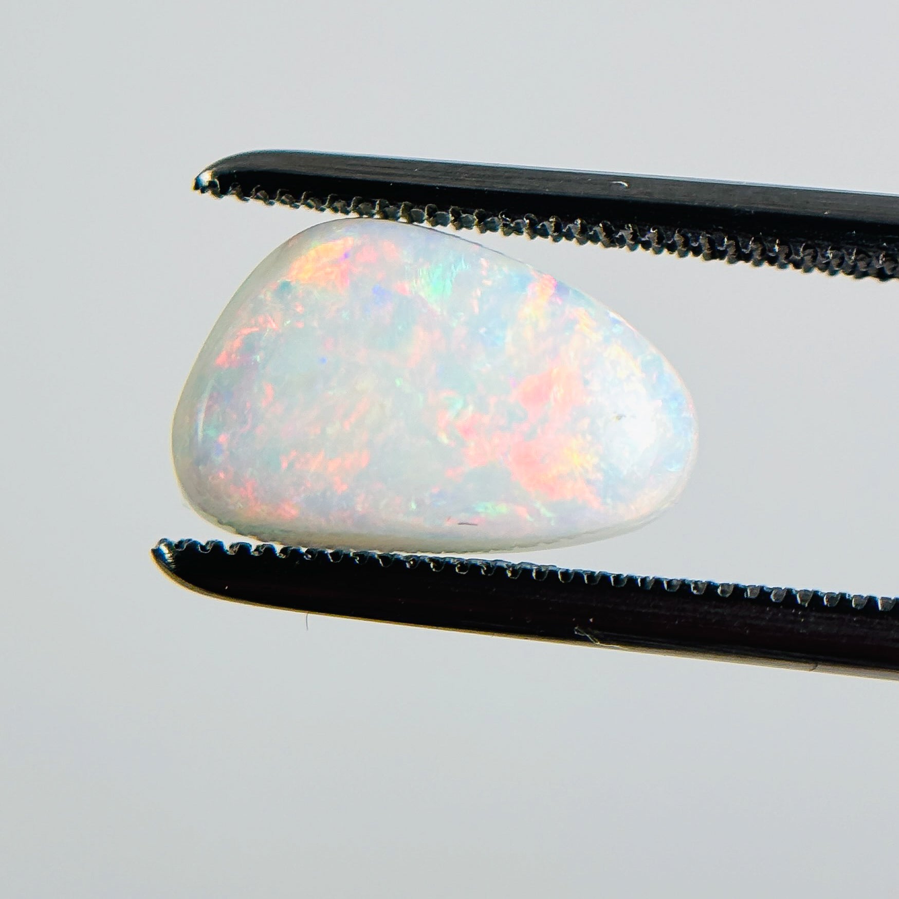 White Opal Multicolour 11x7x3 Cabochon Freeform 1.75 Carat
