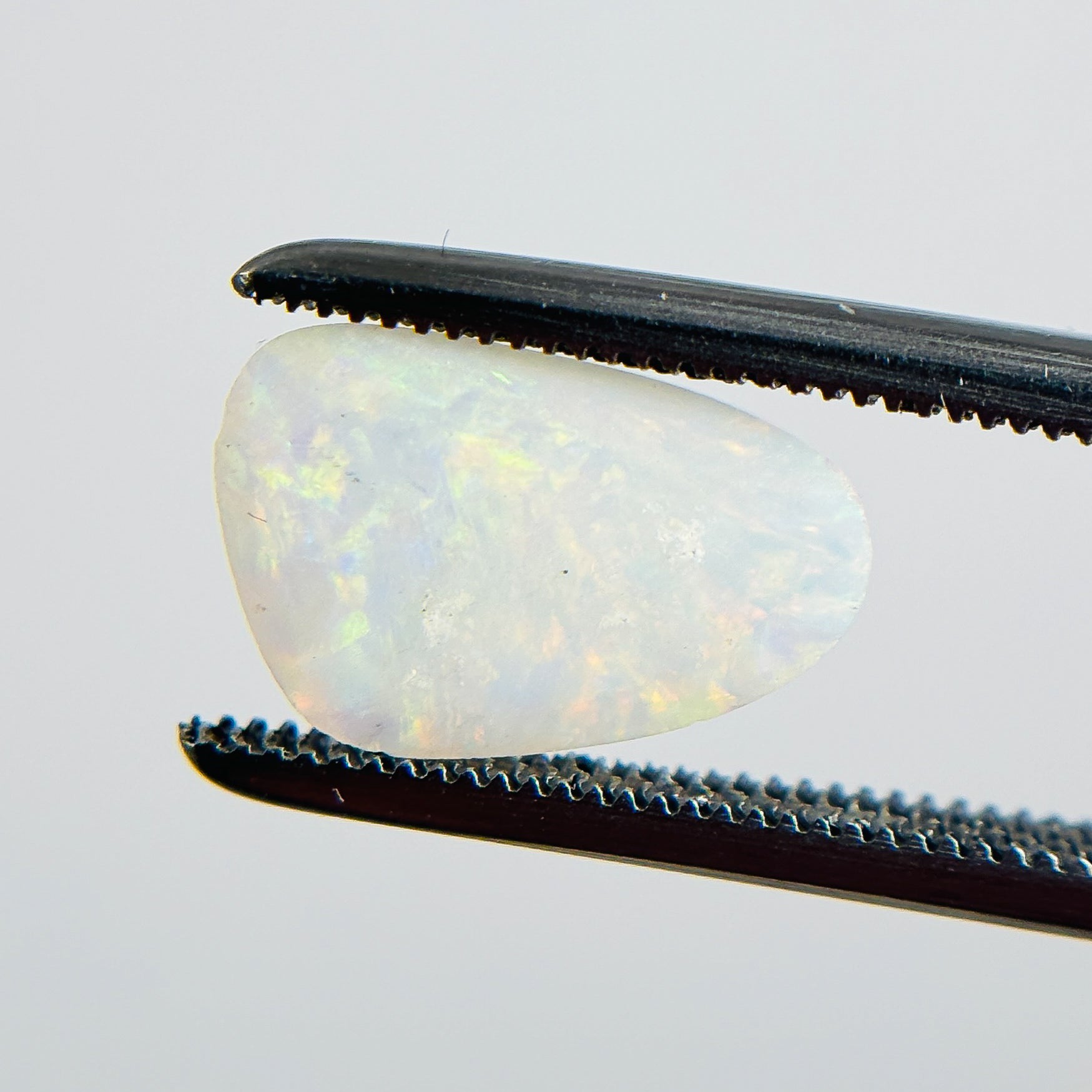 White Opal Multicolour 11x7x3 Cabochon Freeform 1.75 Carat