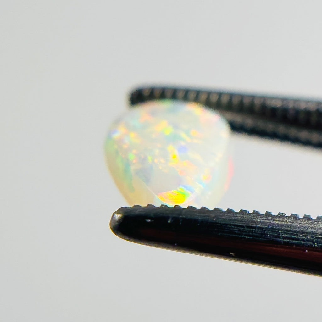 White Opal Multicolour 9x6x2 Cabochon Pear 0.80 Carat