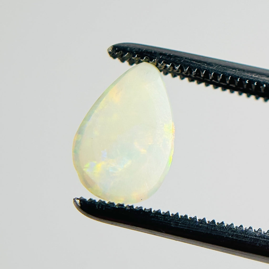 White Opal Multicolour 9x6x2 Cabochon Pear 0.80 Carat