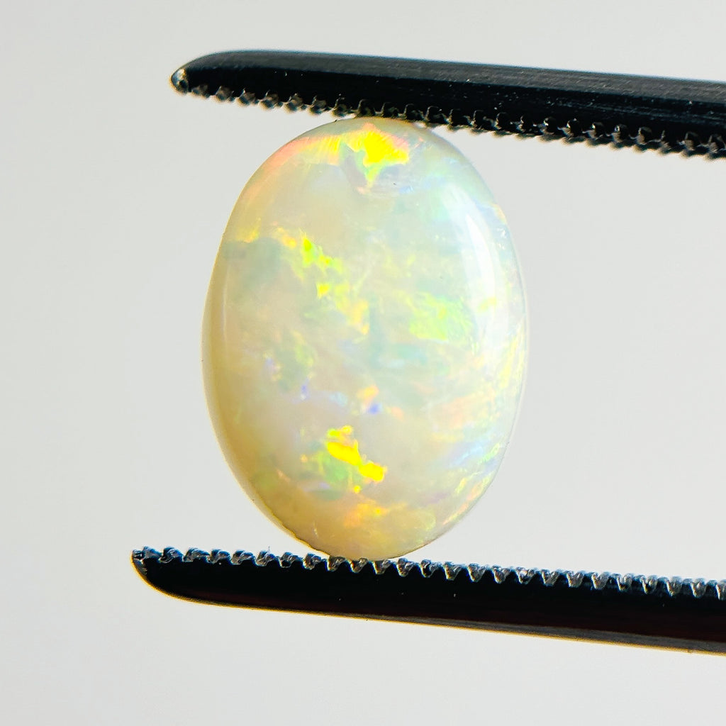 White Opal Multicolour 10x8X3.5 Cabochon Oval 1.85 Carat