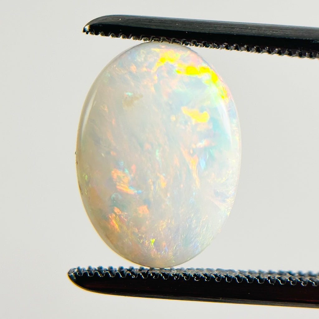 White Opal Multicolour 12x9x3 Cabochon Oval 1.95 Carat