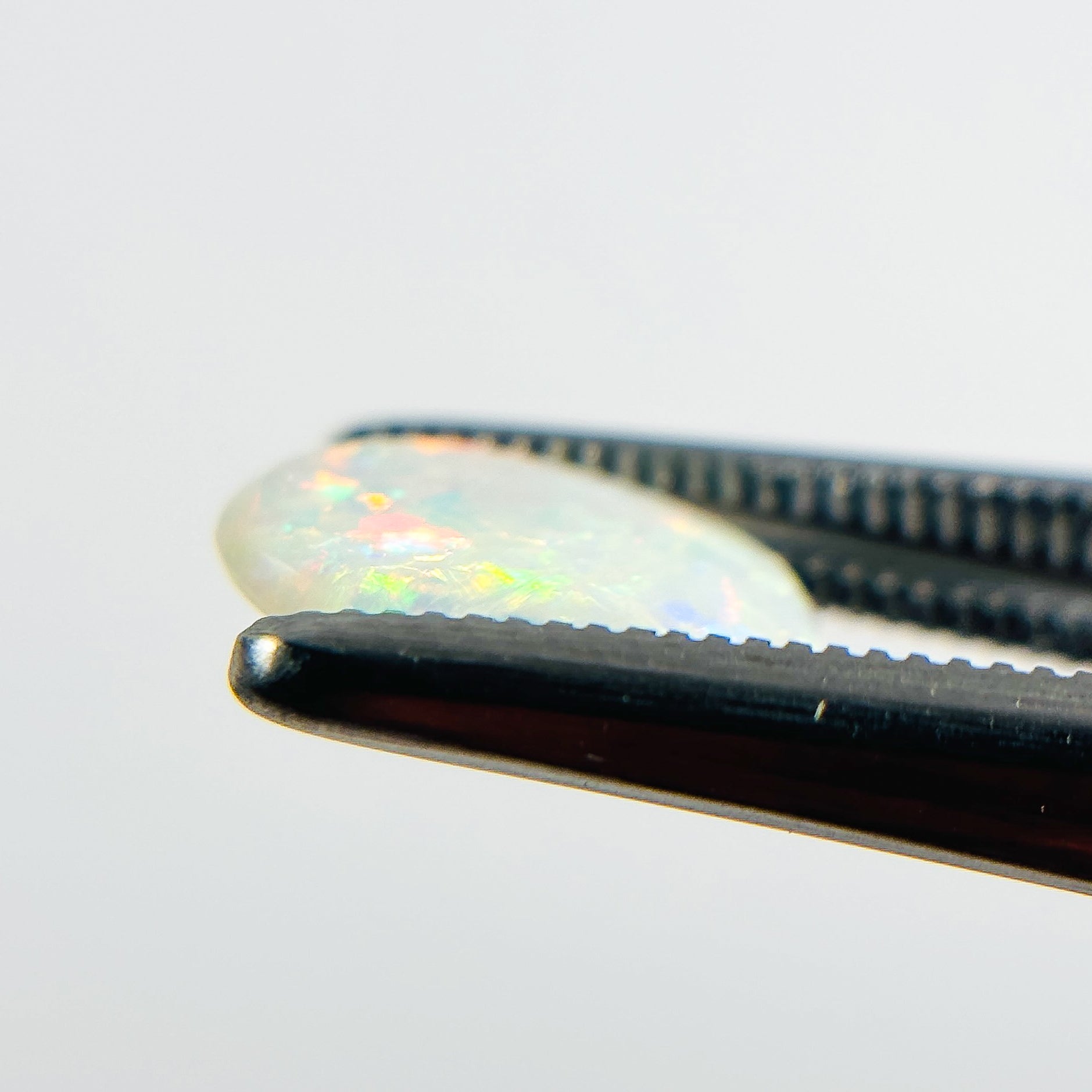 White Opal Multicolour 9x6x2 Cabochon Oval 0.80 Carat