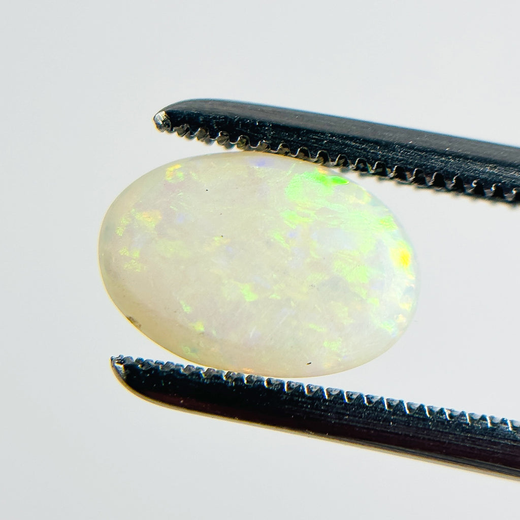 White Opal Multicolour 9x6x2 Cabochon Oval 0.80 Carat
