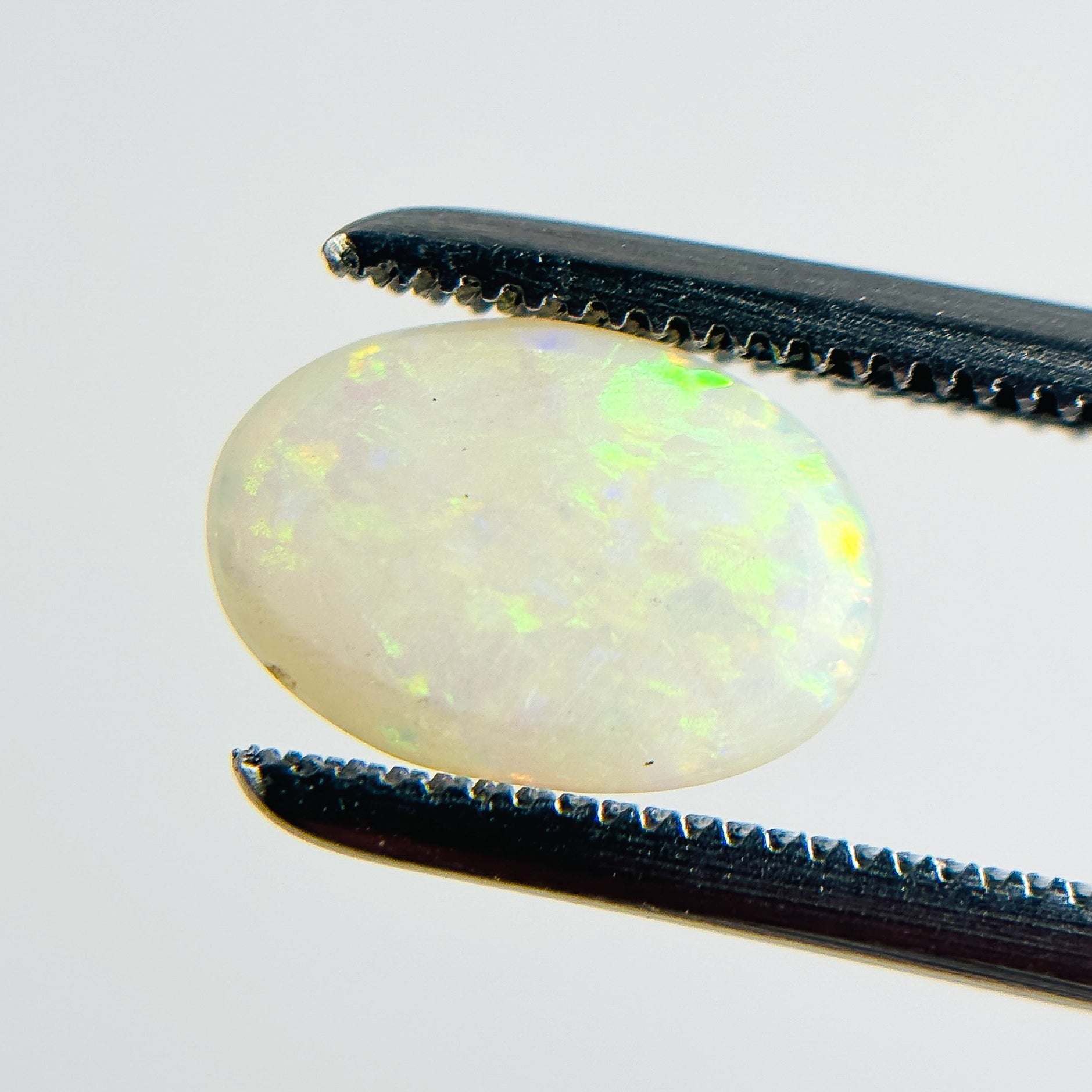 White Opal Multicolour 9x6x2 Cabochon Oval 0.80 Carat