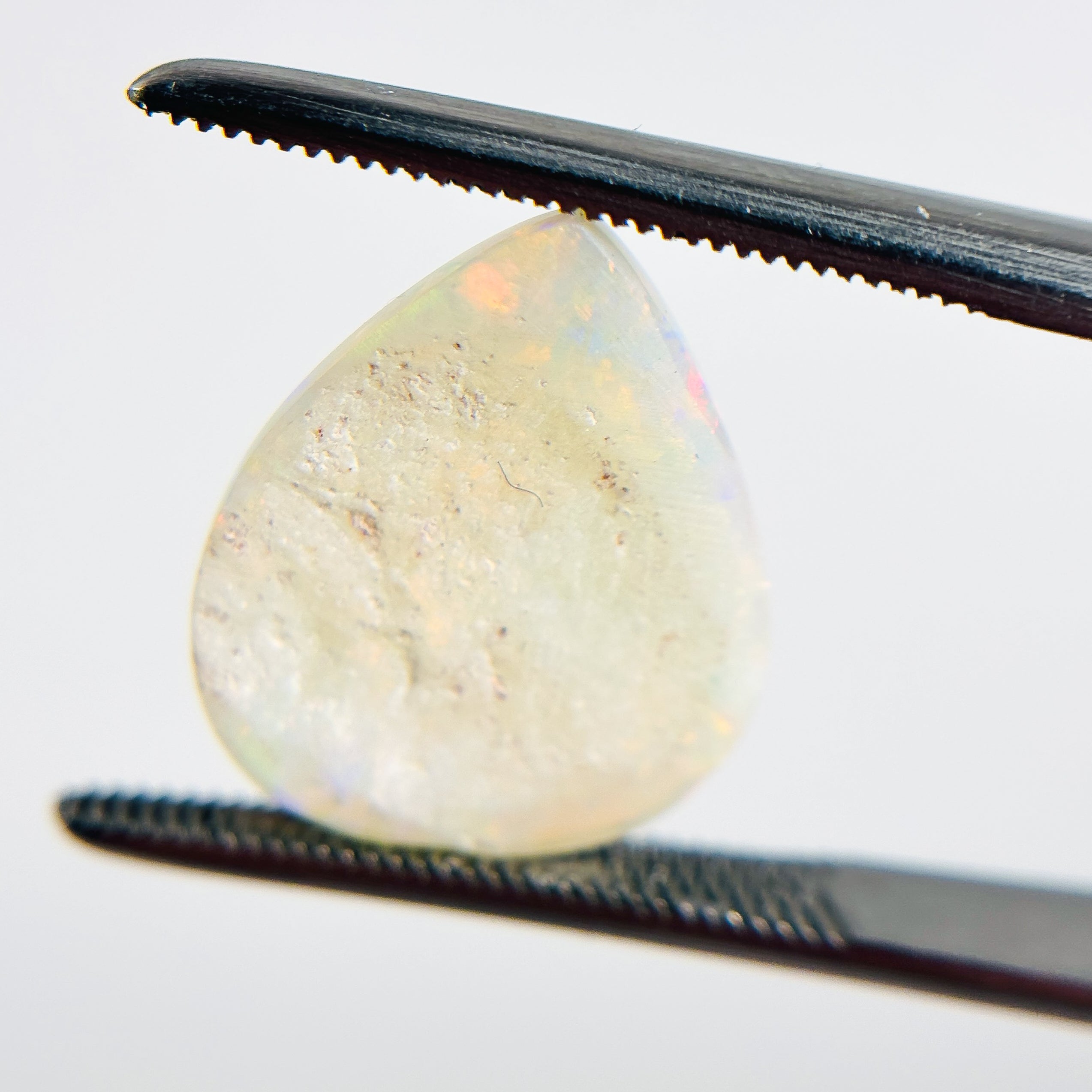 White Opal Red Multicolour 16x13x3 Cabochon Fossil Pear 3.05 Carat