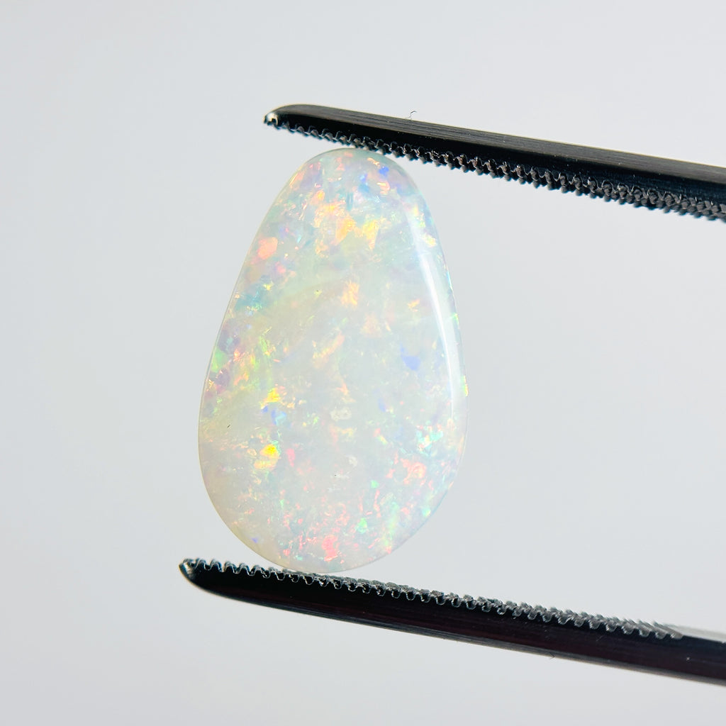 White Opal Multicolour 16x10x2 Cabochon Fossil Pear 2.30 Carat