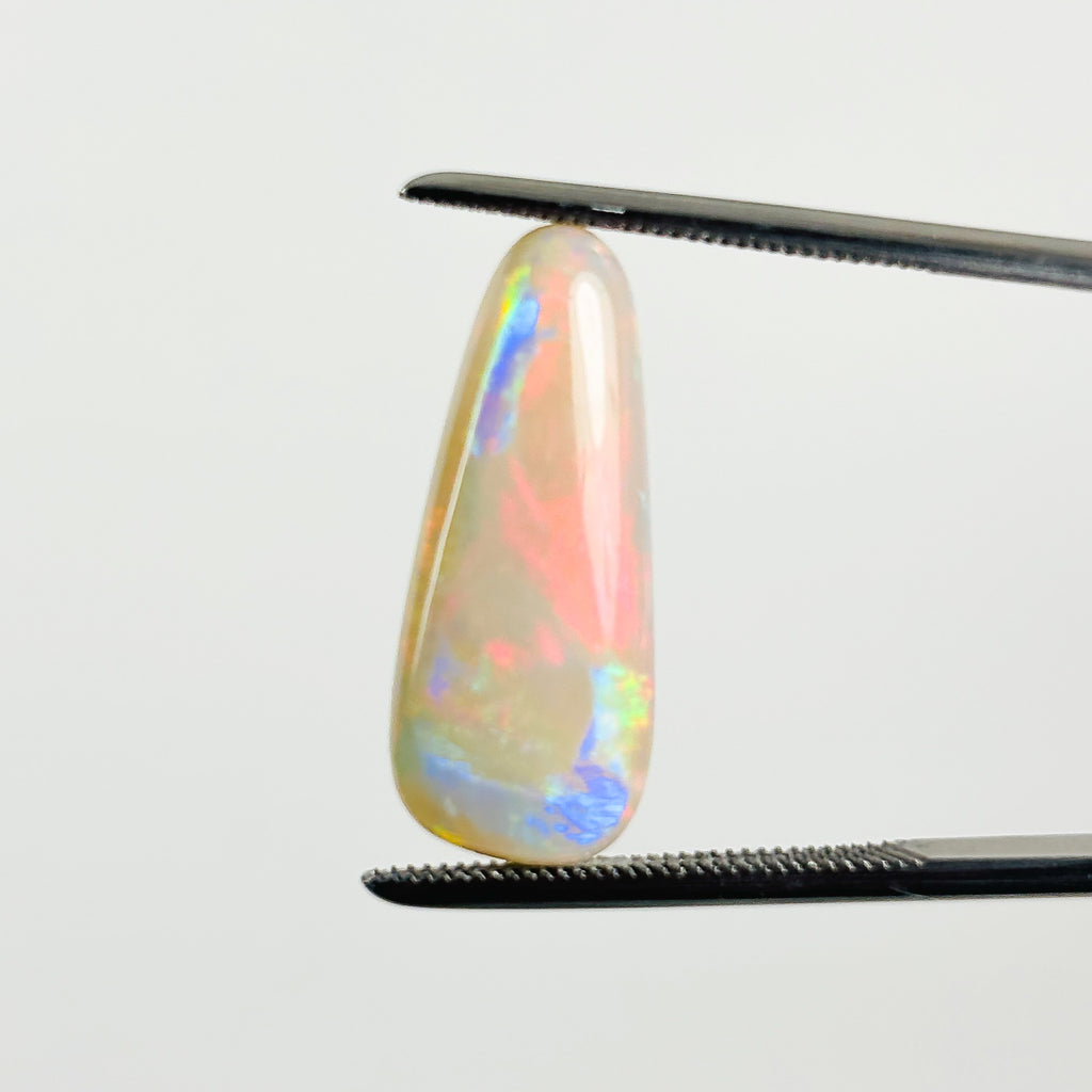 White Opal Red Multicolour 21x8.8x5 Cabochon Pear 5.85 Carat