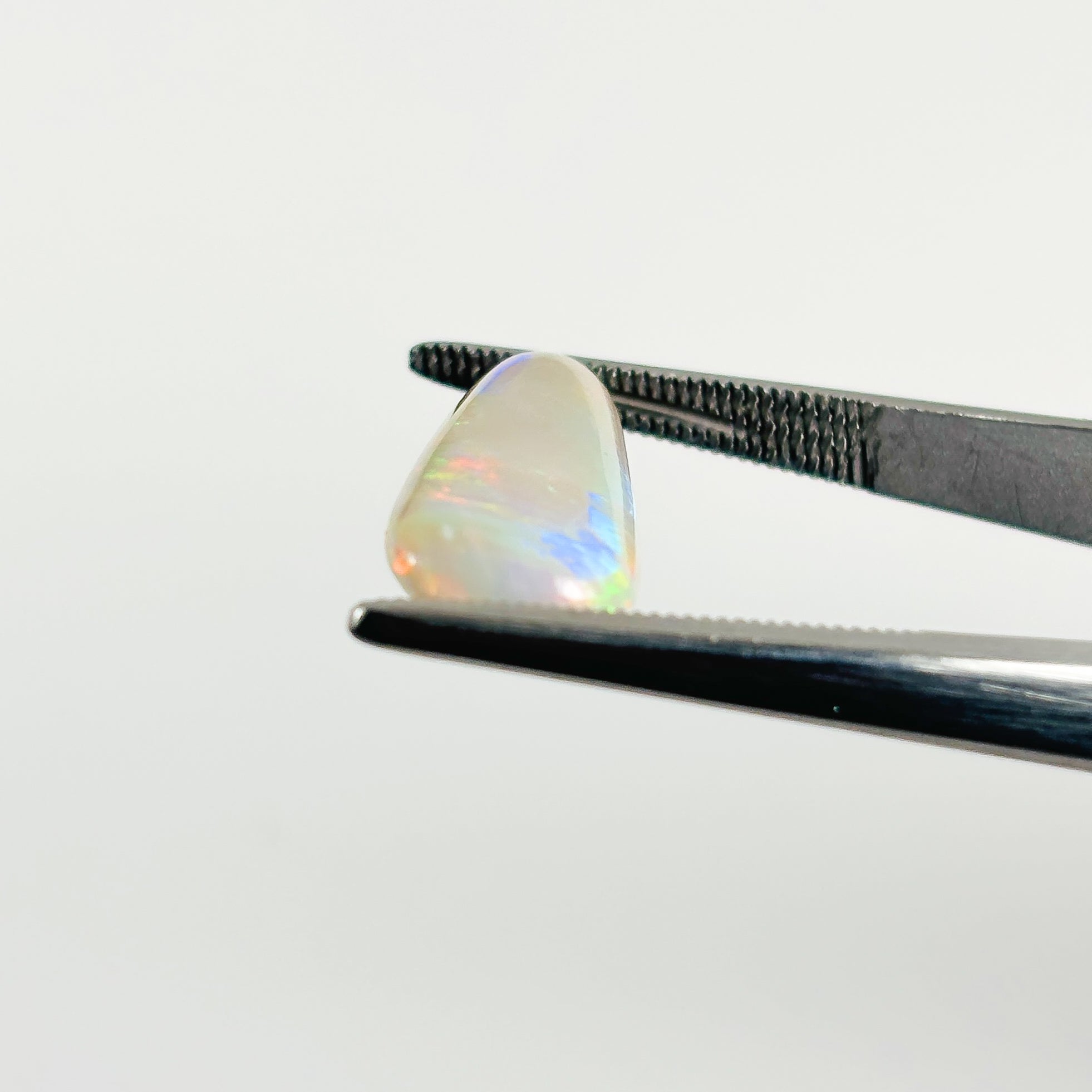 White Opal Red Multicolour 21x8.8x5 Cabochon Pear 5.85 Carat