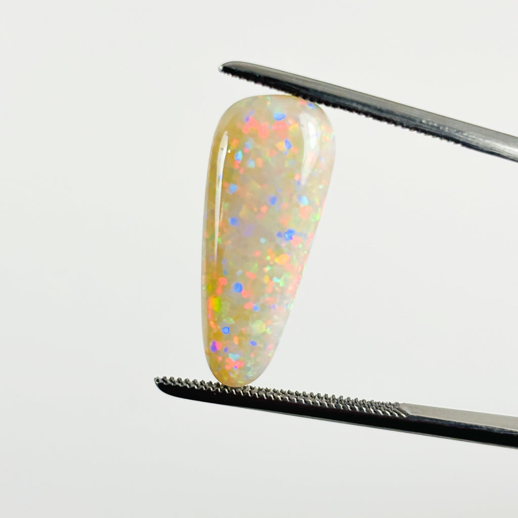 White Opal Red Multicolour 21x8.8x5 Cabochon Pear 5.85 Carat