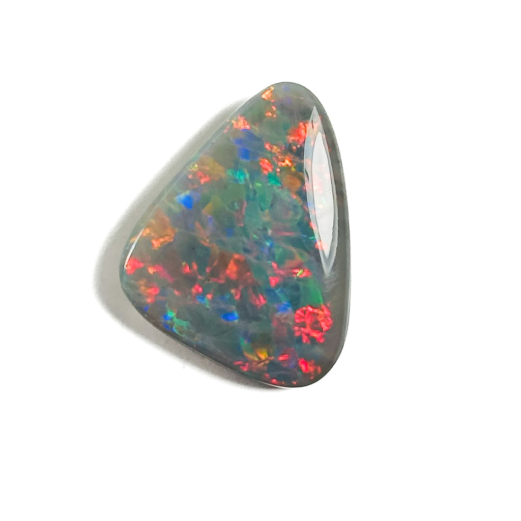 Semi Black Opal Red Multicolour 2x17x4.6 Cabochon Freeform 10.1 Carat