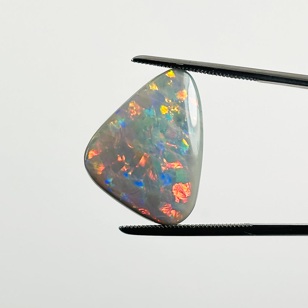 Semi Black Opal Red Multicolour 2x17x4.6 Cabochon Freeform 10.1 Carat
