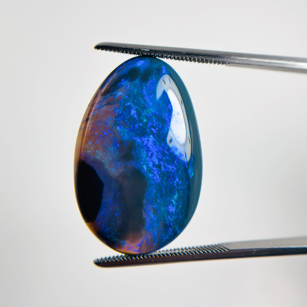 Black Opal Blue Green 28x18x5.8 Cabochon Oval 17.50 Carat