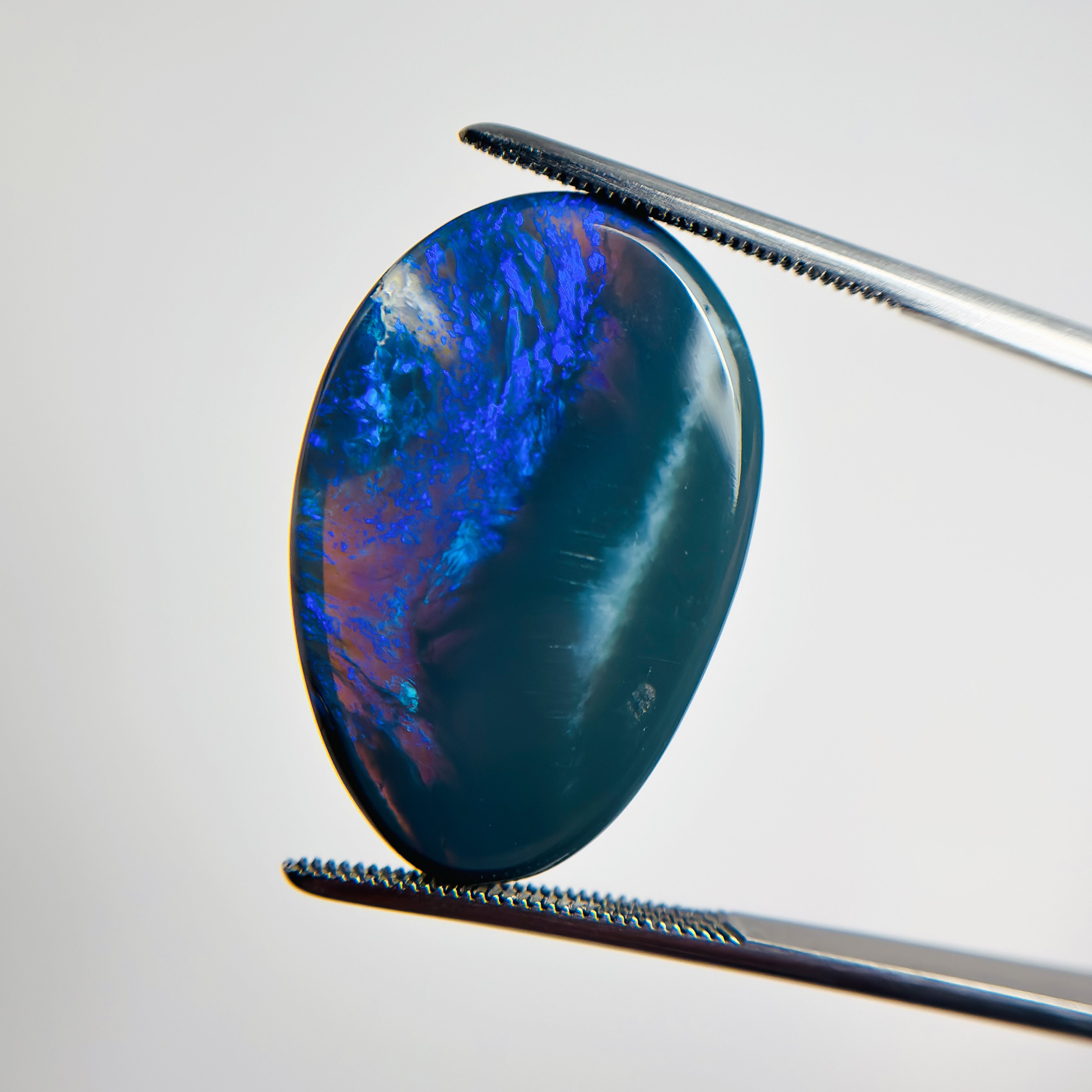 Black Opal Blue Green 28x18x5.8 Cabochon Oval 17.50 Carat