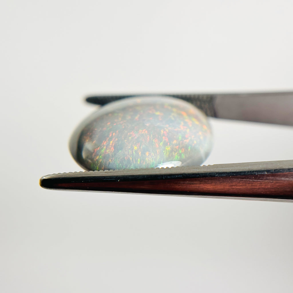 Semi Black Opal Multicolour 21x17x5.5 Cabochon Oval 11.90 Carat
