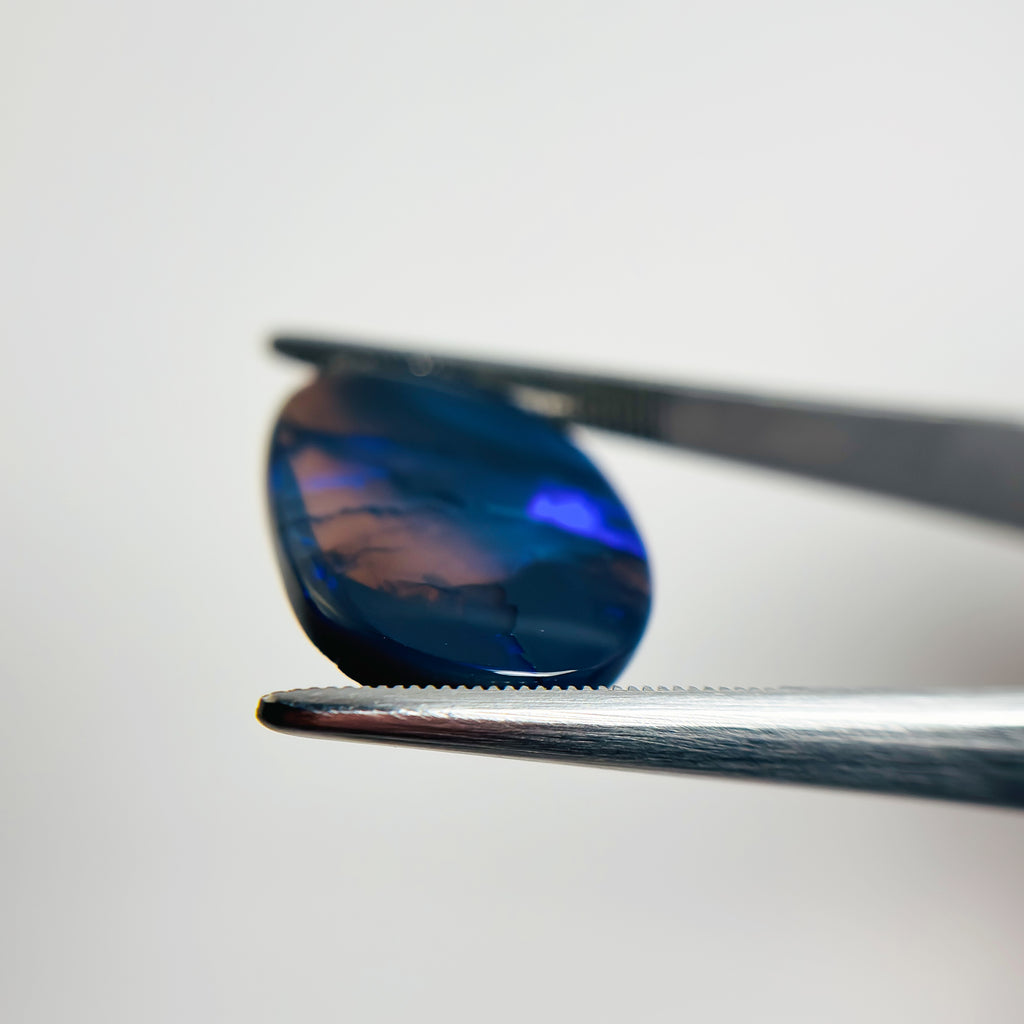 Black Opal Blue 24x16x3 Cabochon Oval 7.75 Carat