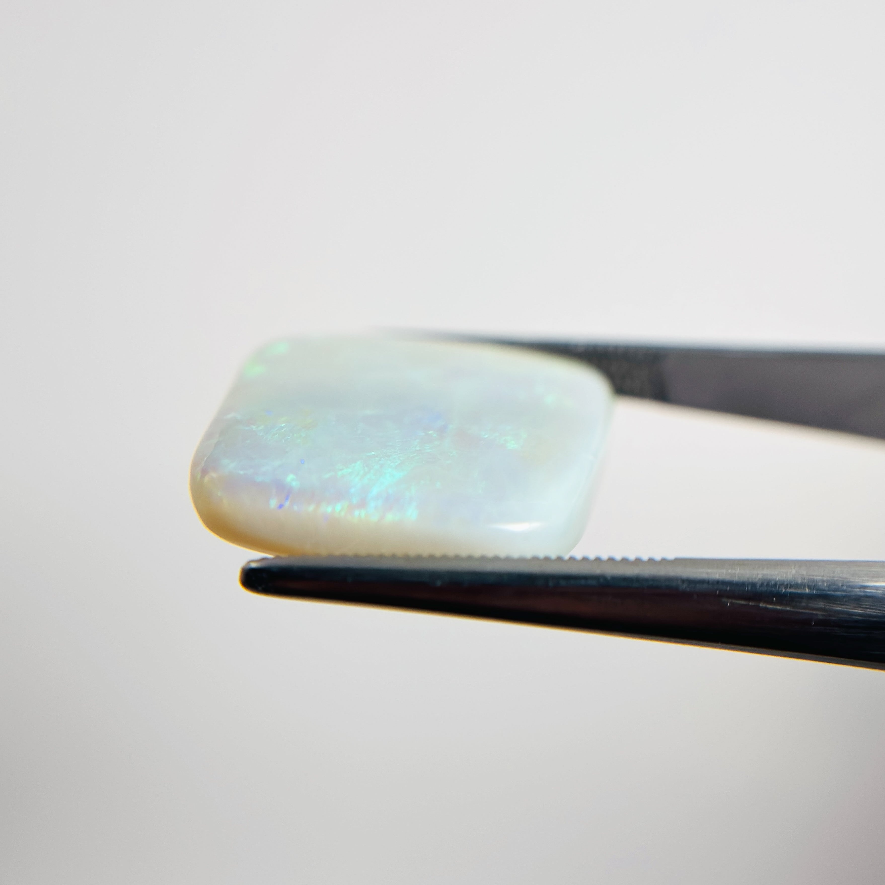White Opal Green Blue 25x19x5 Cabochon Freeform 20.60 Carat