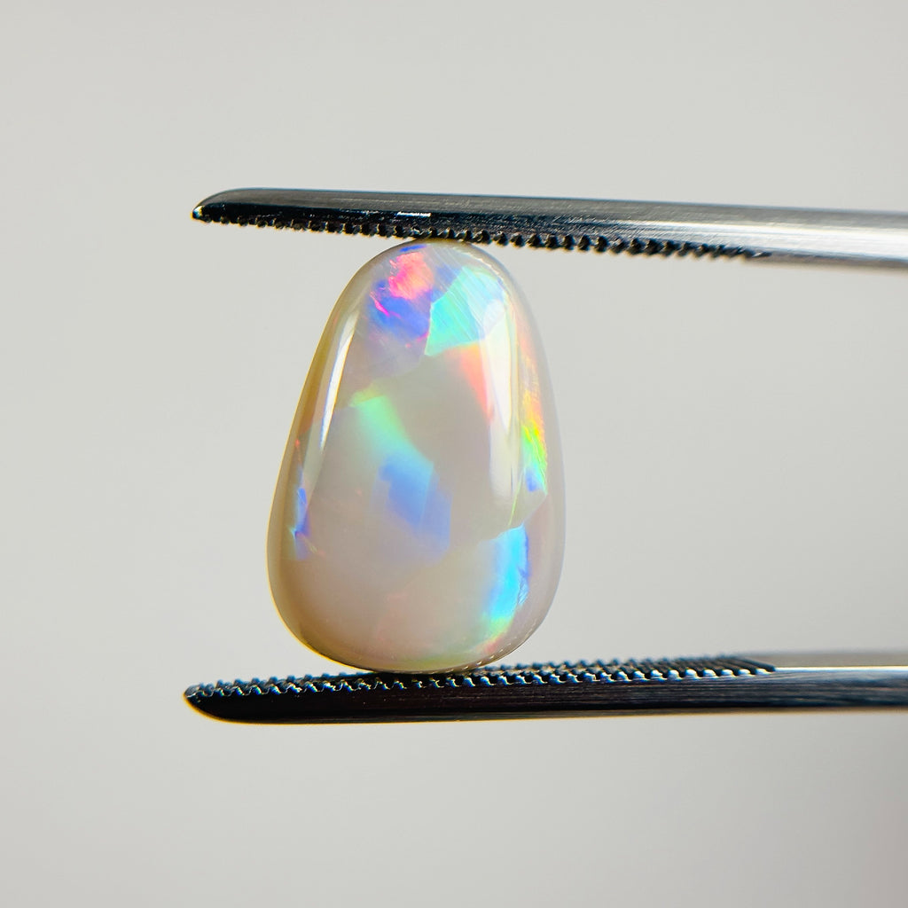 Semi Black Opal Red Multicolour 14x10x5 Cabochon Pear 4.6 Carat