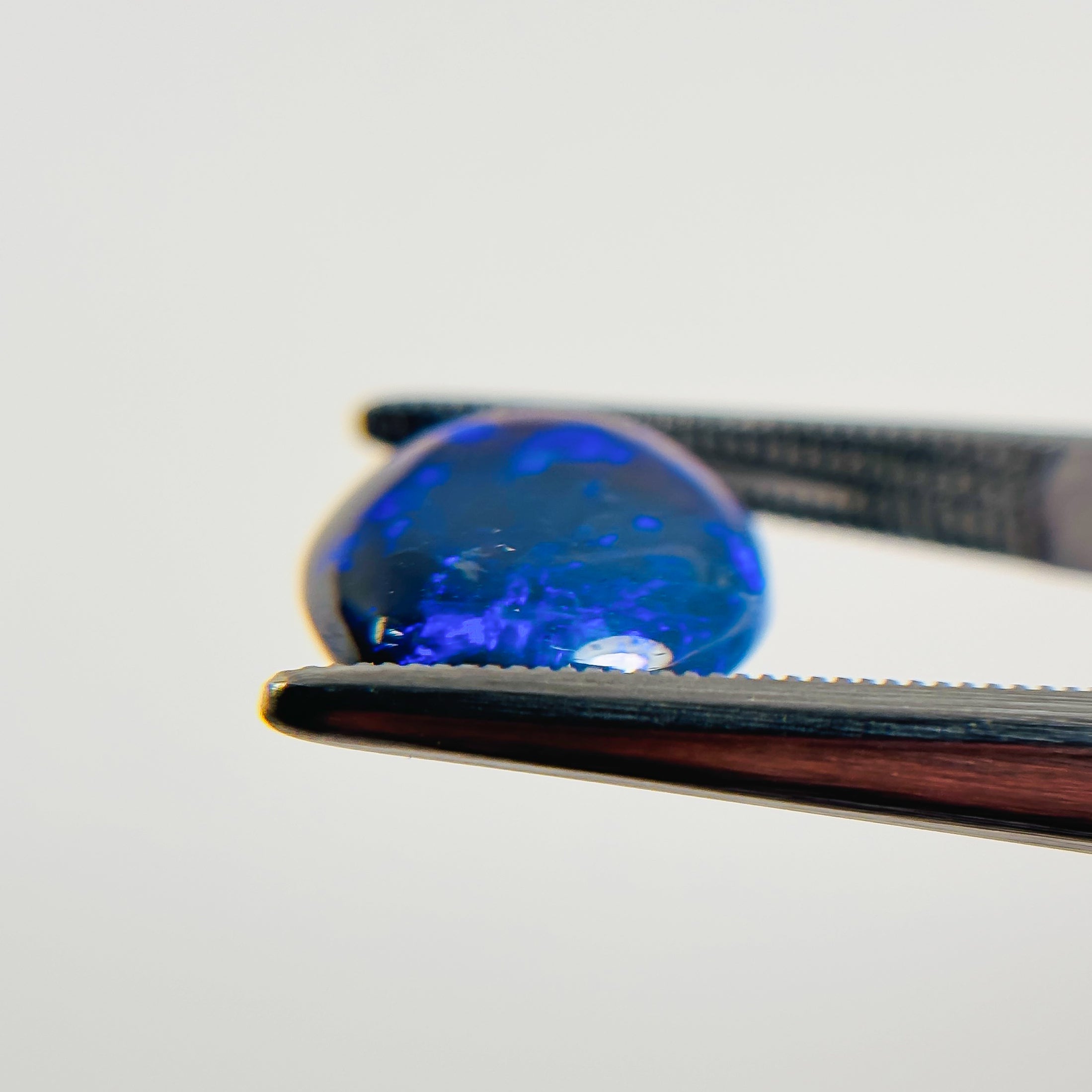 Black Opal Blue 14x11x4.3 Cabochon Oval 4.4 Carat