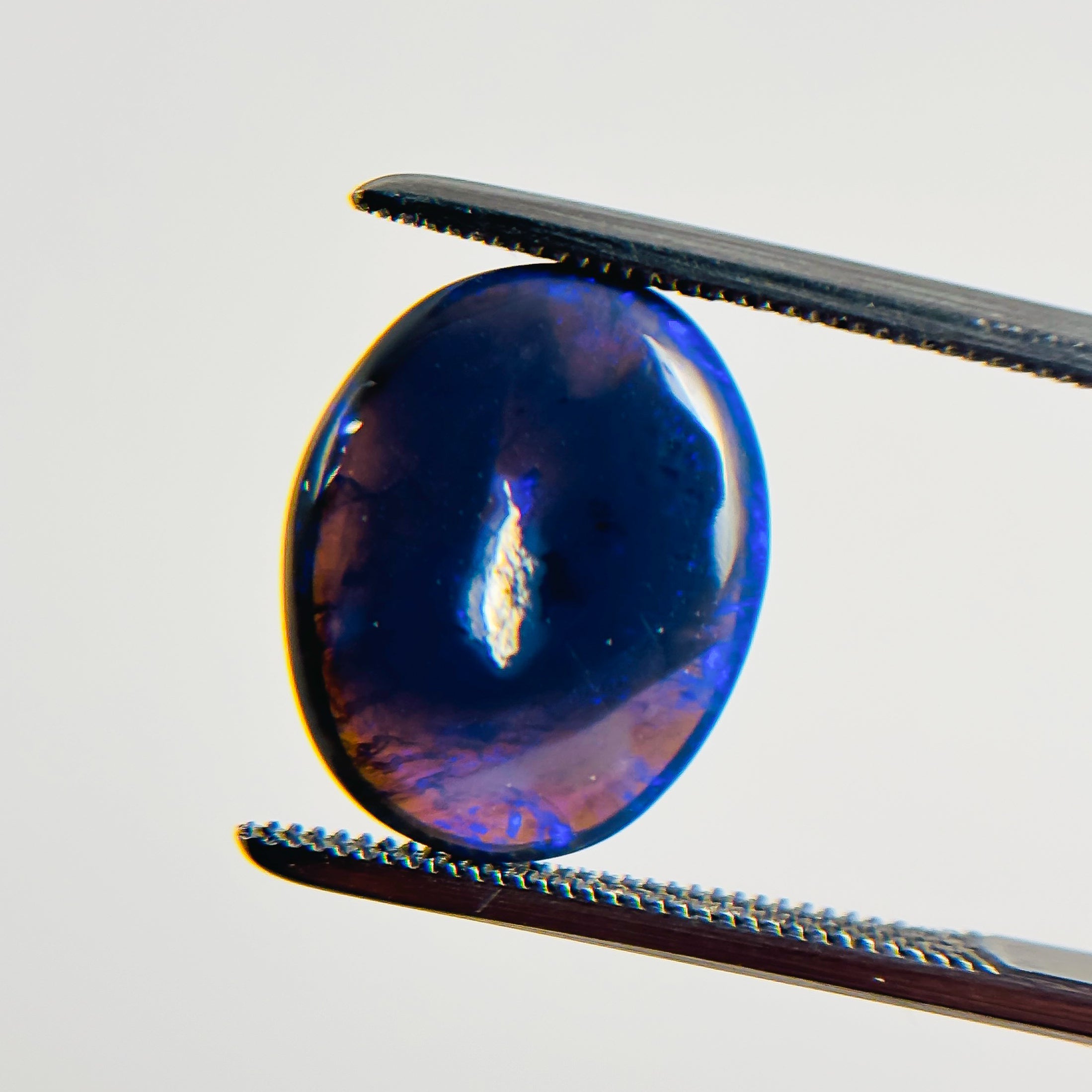 Black Opal Blue 14x11x4.3 Cabochon Oval 4.4 Carat