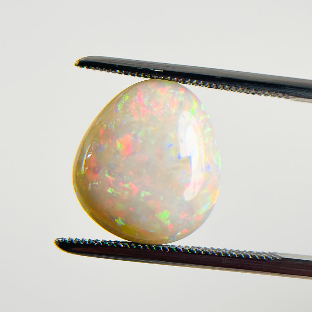 White Opal Multicolour 13x12x5 Cabochon Pear 5.2 Carat