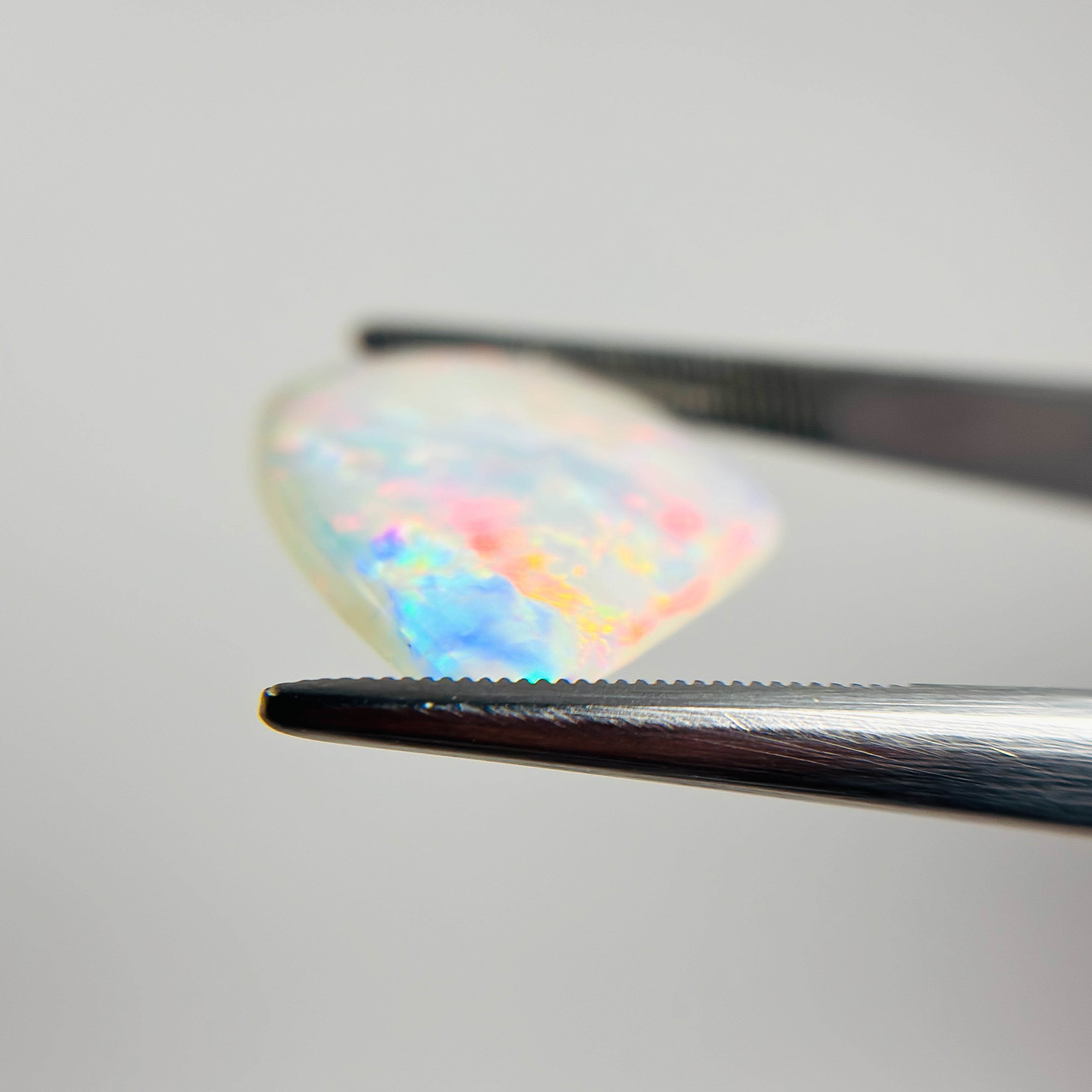 Crystal Opal Red Multicolour 24x18x3 Cabochon Freeform 6.9 Carat