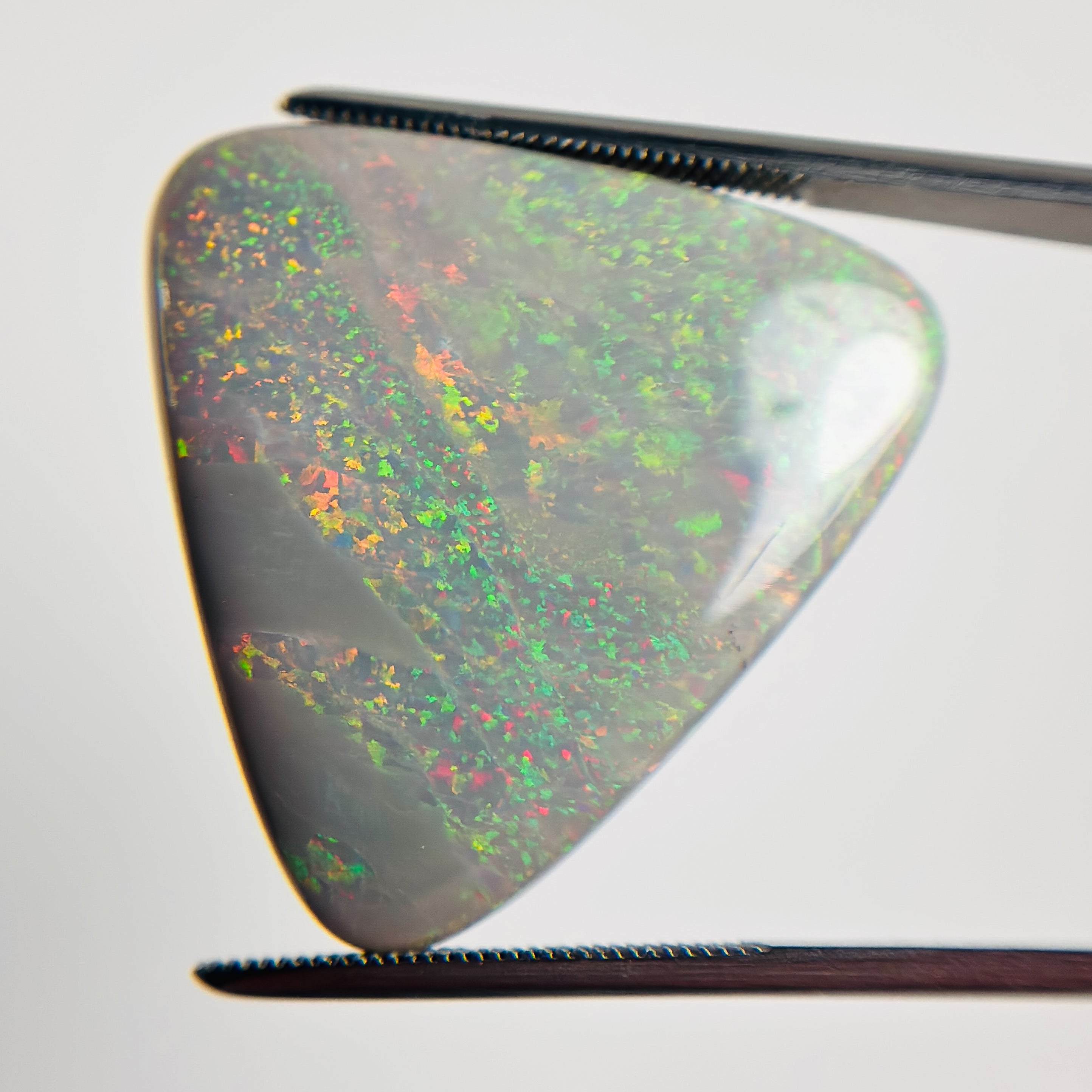 Semi Black Opal Red Multicolour 27x30x5.5 Cabochon Triangle 25.30 Carat