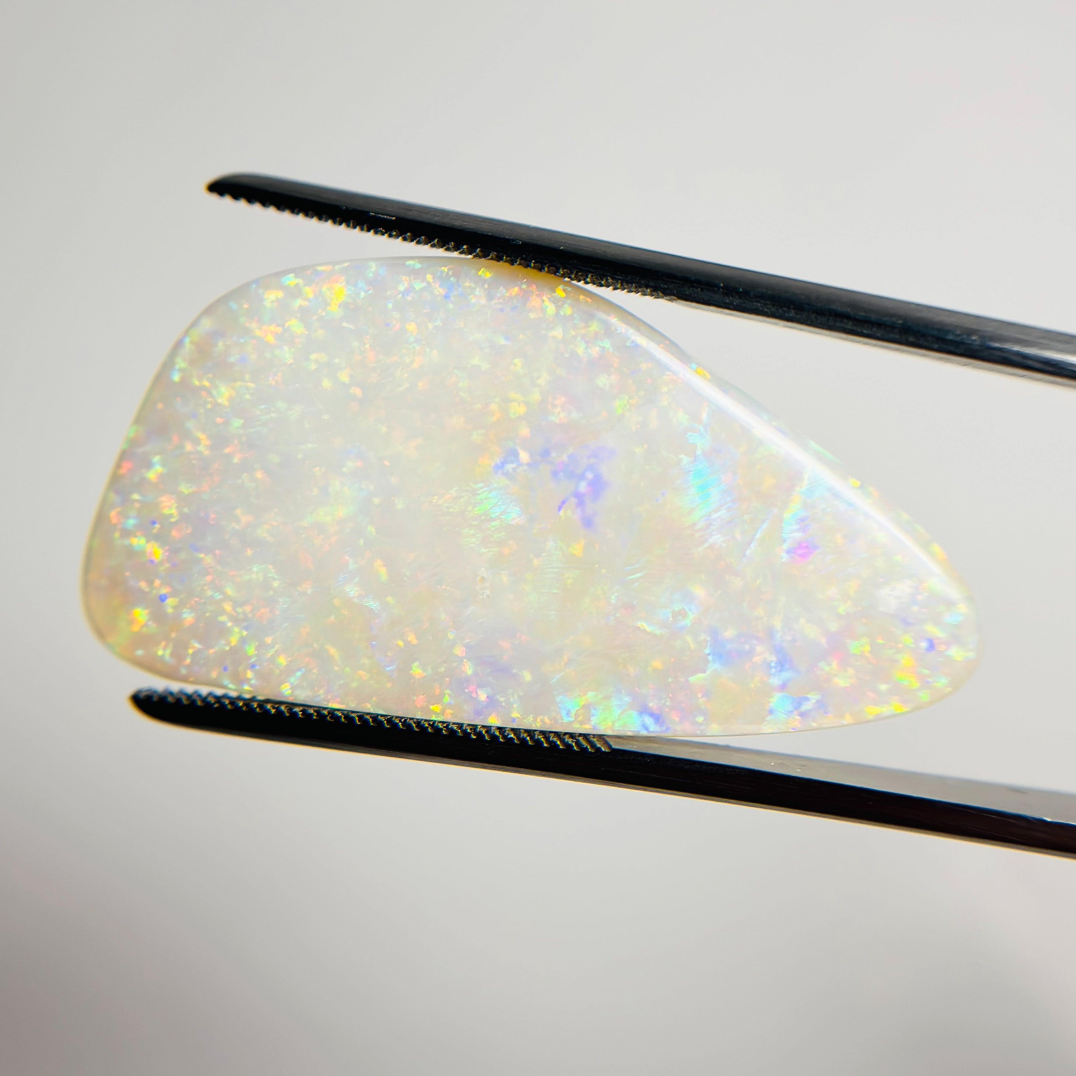 White Opal Multicolour 34x17x3.5 Cabochon Freeform 12.30 Carat