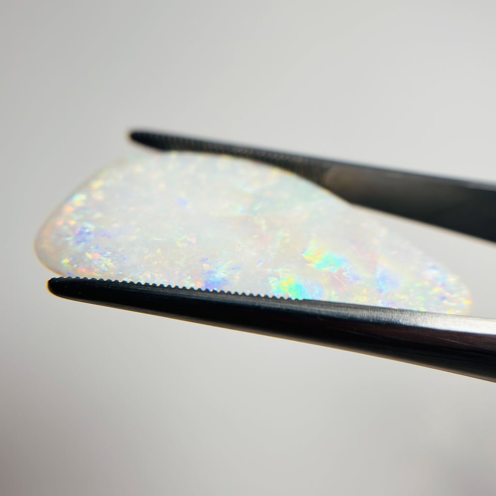 White Opal Multicolour 34x17x3.5 Cabochon Freeform 12.30 Carat