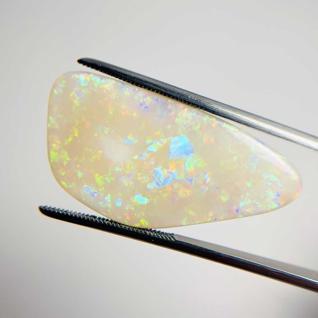 White Opal Multicolour 34x17x3.5 Cabochon Freeform 12.30 Carat