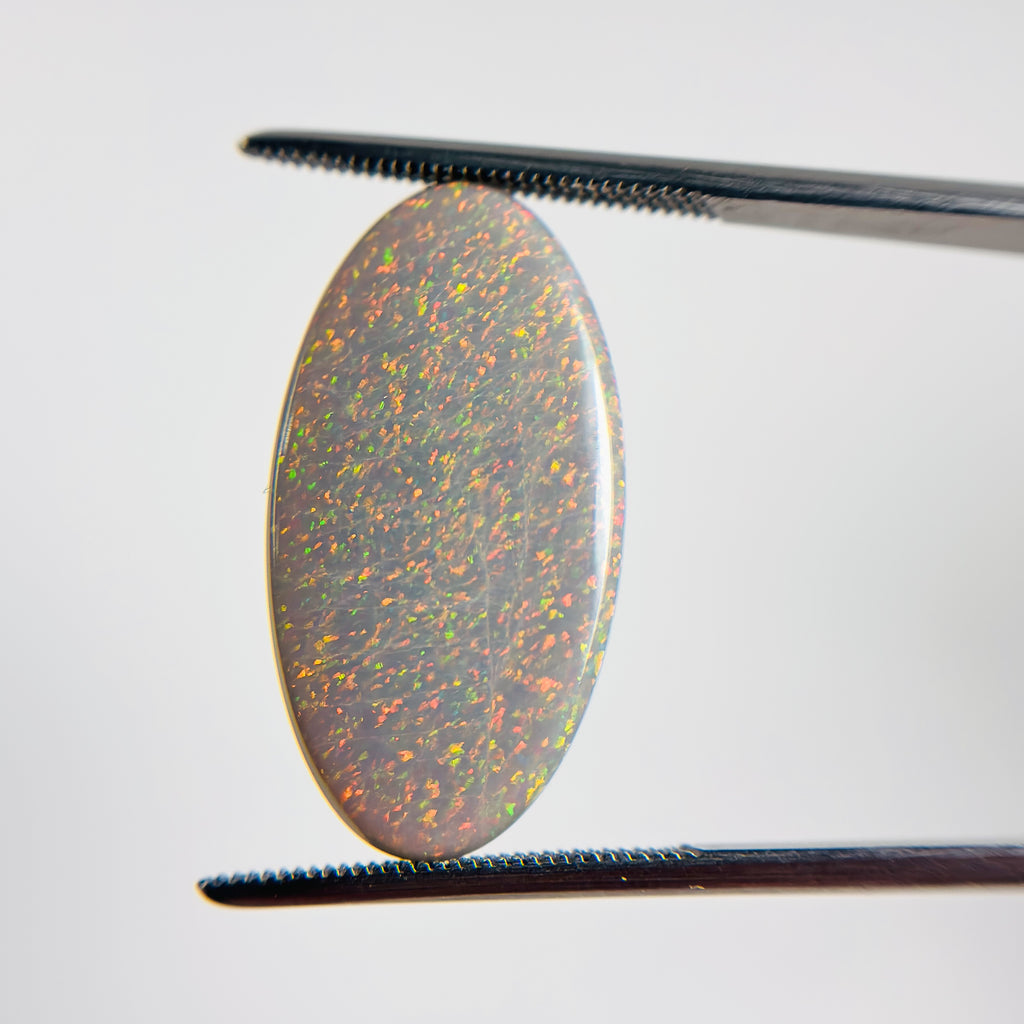 Semi Black Opal Red Multicolour 25x13.5x4.7 Cabochon Marquise 10.65 Carat