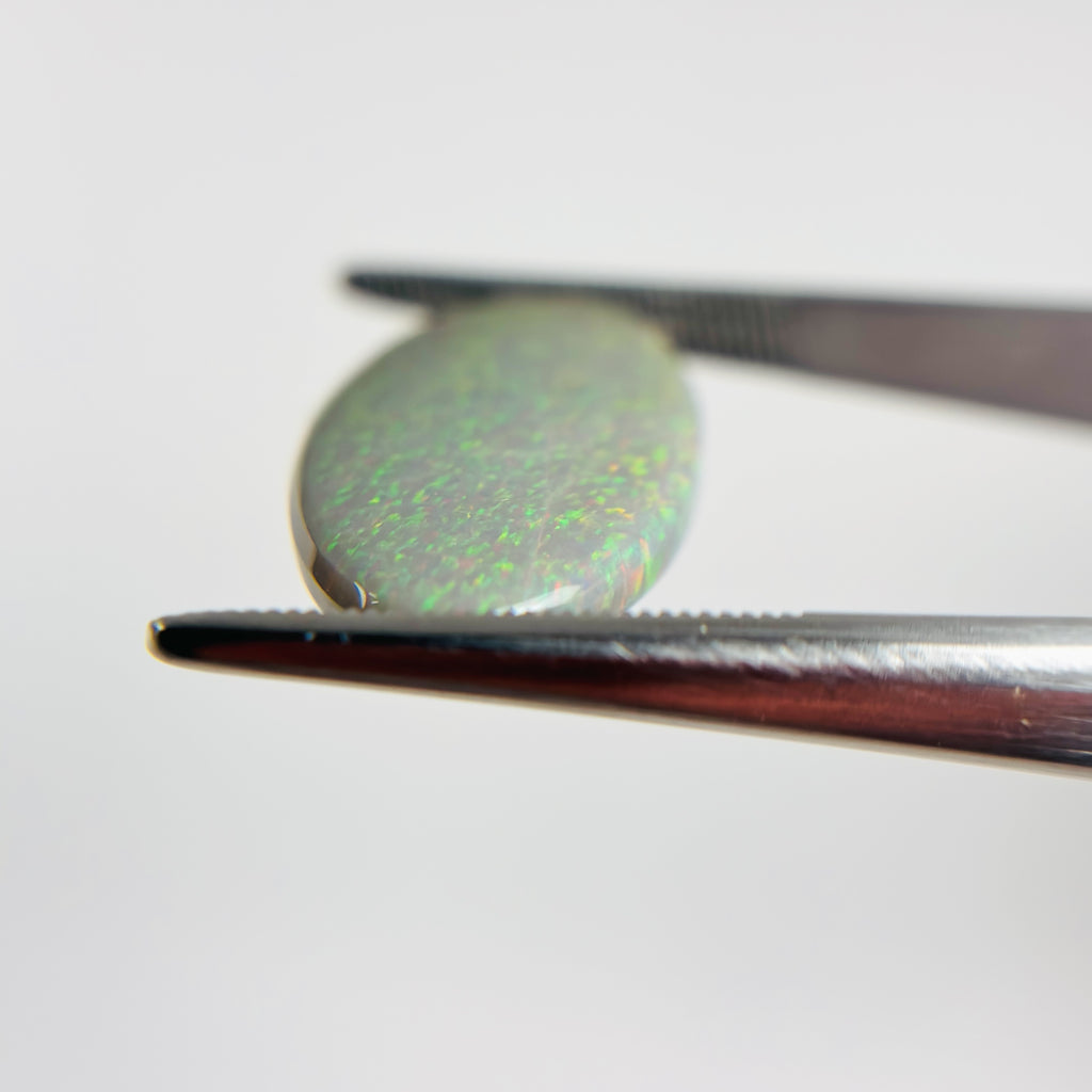 Semi Black Opal Red Multicolour 25x13.5x4.7 Cabochon Marquise 10.65 Carat
