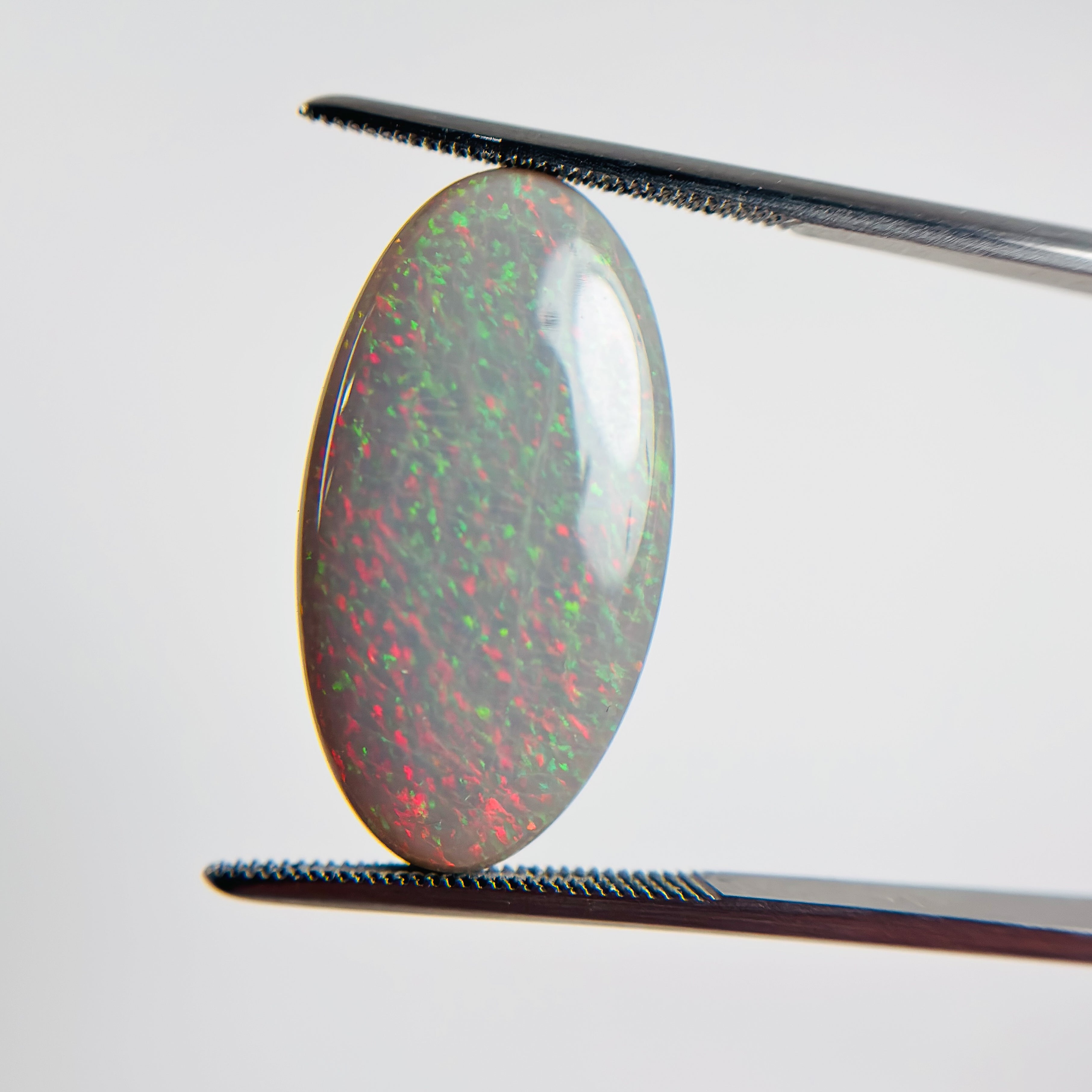 Semi Black Opal Red Multicolour 25x13.5x4.7 Cabochon Marquise 10.65 Carat